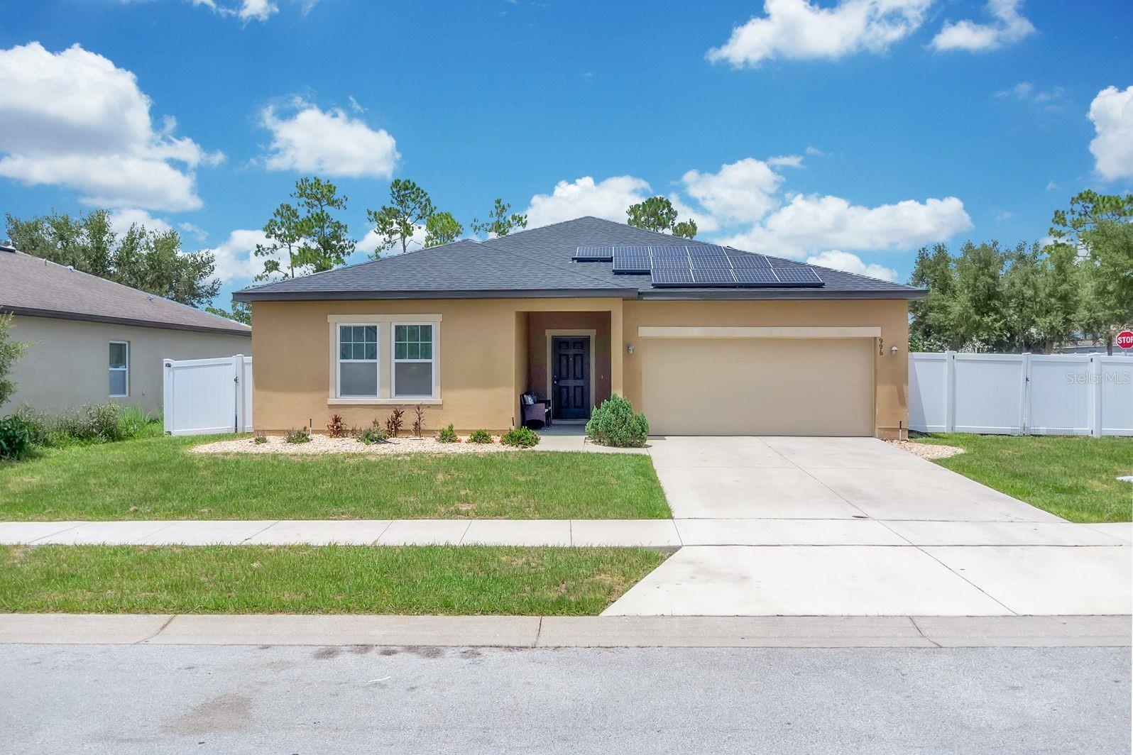 Welcome home to this beautiful corner-lot property located in the highly desirable Whispering Ridge community of Lake Wales! Situated on an expansive corner lot, this home offers extra privacy, additional outdoor space, and excellent curb appeal. The bright, inviting layout is perfect for both relaxing and entertaining. Enjoy a beautifully remodeled kitchen completed in 2026, featuring modern finishes and an updated design that makes cooking and entertaining even more enjoyable. Recent updates Roof (2025), Interior Paint (2025), Microwave (2025), Refrigerator (December 2024), and Kitchen Remodel (2026). The home is equipped with solar panels that help keep electricity costs low during Florida's hot summer months. The seller will pay off the solar panels at closing, allowing the new owner to enjoy all the energy-saving benefits without assuming the existing solar loan. Enjoy the peaceful neighborhood with low monthly HOA fees that provide access to a community playground and beautifully maintained common areas. Conveniently located near schools, grocery stores, shopping centers, restaurants, medical facilities, and scenic parks, this home offers the perfect combination of comfort, convenience, and accessibility. Whether you're a first-time homebuyer or looking to upgrade, this corner-lot gem is a must-see. Schedule your private tour today and make this dream home yours!