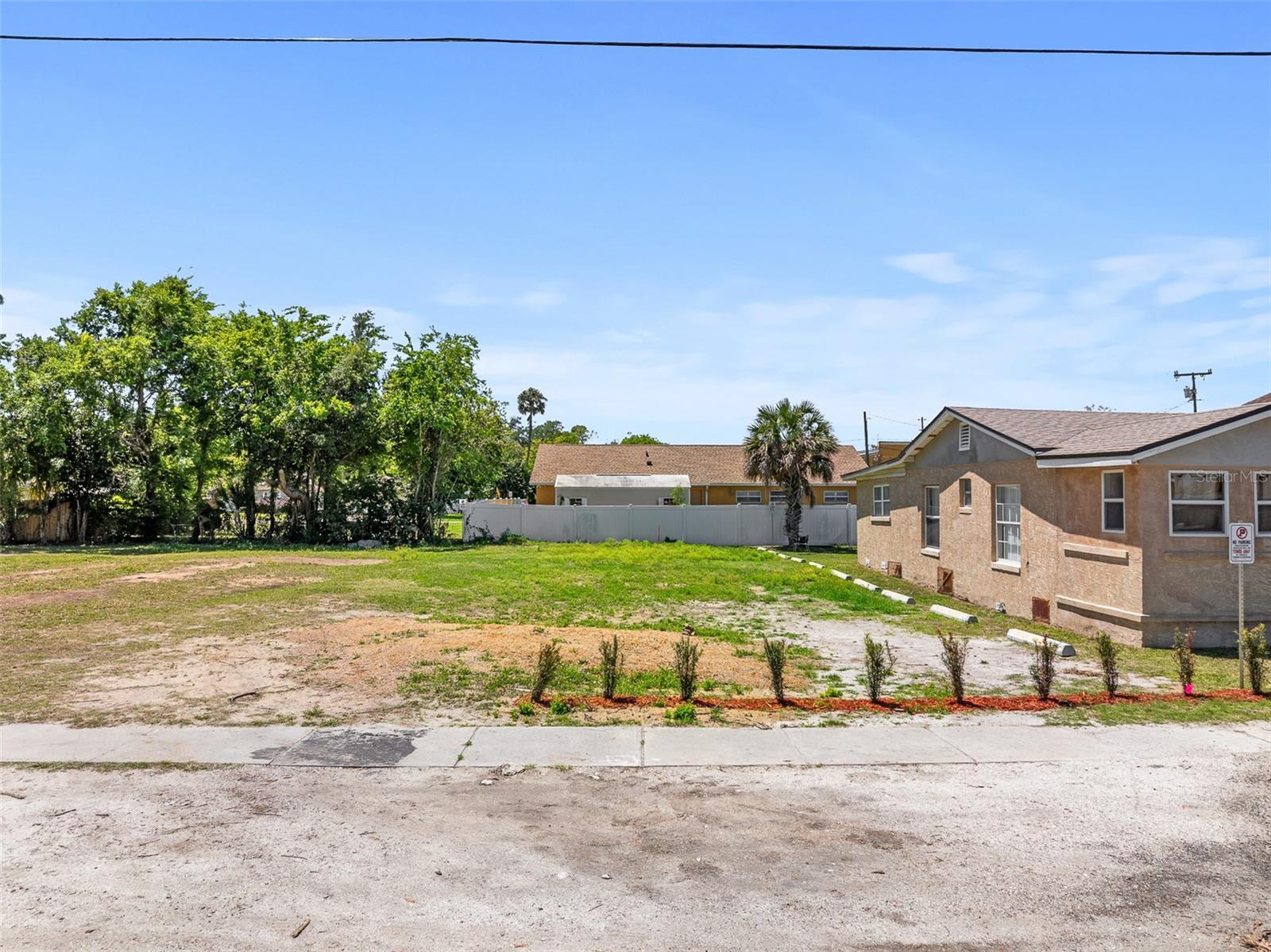 Exceptional infill lot opportunity in the heart of Daytona Beach. This 30x100 parcel is zoned RMD-5, sits in Flood Zone X, and has nearby access to water, sewer, electric, telephone, street lights, and BB/HS internet capability. Ideally positioned near Bethune-Cookman University in Daytona’s Midtown area, this property offers compelling potential for investors, developers, and buyers seeking a centrally located residential homesite with upside. The area is seeing continued community investment, including recent improvements to Midtown recreation facilities and Daisy Stocking Park, while Daytona Beach’s college and university population supports year-round housing demand. Whether you are planning a new build, securing a future development site, or expanding your portfolio with a well-located lot, this parcel deserves a close look. Buyer and buyer’s agent to verify all information important to their intended use.
