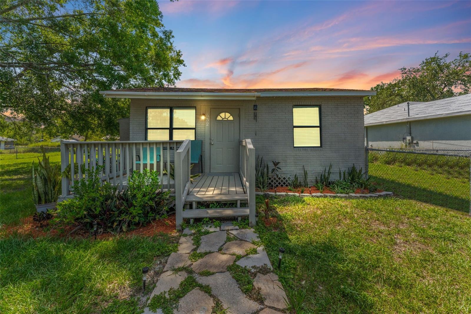 Welcome to the perfect move-in-ready home, where modern updates meet classic charm! Nestled on a huge lot (right under 1/3 acre) with a giant fenced-in backyard, this beautifully updated home offers the perfect blend of comfort, convenience, and upgrades. Step onto the charming front porch and into a completely renovated interior featuring brand-new luxury vinyl plank (LVP) flooring throughout and fresh interior paint. The exterior was recently painted along with upgraded landscaping, giving the home incredible curb appeal. Inside, you'll find a light and airy, newly remodeled bathroom with a spacious walk-in shower, as well as a separate laundry room for added convenience.
The kitchen, also recently remodeled within the last year, is equipped with brand-new stainless steel appliances, perfect for creating delicious home-cooked meals. A newer water heater ensures efficiency, while the thoughtful updates throughout make this home truly move-in ready. Located near Eagle Lake Park and just five minutes from Bartow Executive Airport, Publix, Chick-fil-A, Walmart, Harbourside Restaurant, and many other local amenities, this home offers both tranquility and convenience. Plus, with easy access to US Hwy 17 and County Road 540, commuting to Winter Haven, Orlando, Lakeland, or Tampa is a breeze!