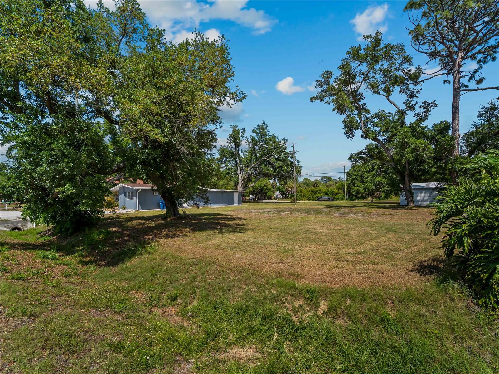 Discover the perfect opportunity to build your dream home on this cleared vacant lot located on Shamrock in Venice, FL.  8,000 square feet with dimensions of 100' x 80', this cleared lot offers a blank canvas ready for your vision. One of the standout features of this property is its desirable private beach access, available through a modest annual membership of just $200. Additionally, the lot qualifies for membership in the South Venice Yacht Club at an affordable rate of $150 annually, providing access to recreational opportunities and social events. Enjoy the freedom that comes with no HOA fees and the added benefit of no flood insurance required.

The location is truly unbeatable, under 5 minutes to shopping centers with Lowes, Marshalls, Aldi, Bone Fish Grill, First Watch and so much more! Situated just 15 minutes from Wellen Park—a vibrant area known for its shopping, dining, and entertainment options—and only 8 minutes from the charming downtown Venice. The local scene is rich with a variety of restaurants and shops that cater to diverse tastes, ensuring you have everything you need within reach. For those who love spending time by the water, you're only 7 minutes away from the beach ferry that takes you to a private beach with stunning shorelines and tranquil waters. Only 5 minutes to Shamrock Park with a nature center/trails, playground, tennis and basketball courts, picnic area, and access to Legacy Trail via the Venetian Waterway Park, which runs along the intracoastal.

Whether you're looking to create a peaceful retreat or an active lifestyle close to nature and community amenities, this vacant lot on Shamrock presents endless possibilities in one of Florida's most sought-after coastal towns. Embrace all that Venice has while enjoying the privacy and potential of your own piece of paradise.

Adjacent vacant parcels are available on Dawn located behind this Shamrock lot.