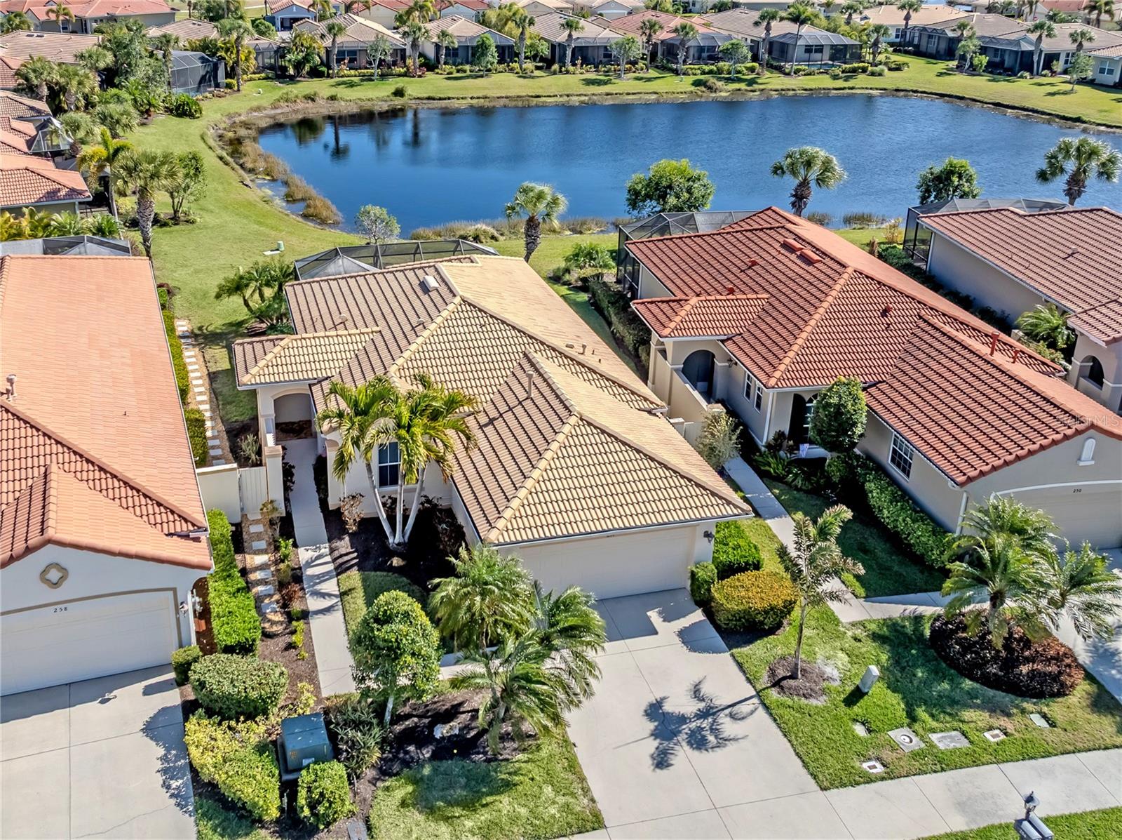 Maintenance-free WCI-built home move-in ready! Two-bedroom, two-bath plus den maintenance-free home in the desirable Venetian Golf & River Club. Offering serene water views and exceptional updates throughout, this residence shows like new! Enjoy lovely tile flooring in the main living areas, a separate dining room, and a spacious kitchen featuring light cabinetry, updated countertops, stainless steel appliances, a breakfast bar, and a sunny eat-in area. The open Great Room boasts elegant tray ceilings and tranquil pond views, creating a light and inviting space for everyday living and entertaining. The spacious primary suite offers comfort and style, complemented by an updated bath and generous closet space. Go through sliding glass doors to your screened lanai where you can relax and unwind while overlooking peaceful water views. This home is in excellent condition, FURNISHED and move-in ready.  Hurricane impact glass throughout allows for a discount in home insurance.  See all it has to offer, you’ll fall in love! Enjoy the River Club which includes a resort-style pool, hot tub, lap pool, poolside tiki bar, fitness center and classes, formal dining, outdoor patio, casual bar and clubhouse. Golfing membership is optional. One of the best communities in Sarasota County, set on the Myakka River. The Venetian Golf and River Club is a 24-hour guard-gated community just a few miles from Nokomis Beach and beautiful downtown Venice Island, shopping, medical facilities, banking, the Legacy bike trail and more!
