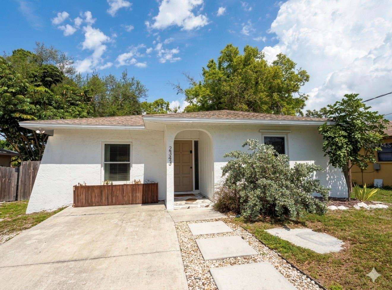 Rare opportunity just minutes from Siesta Beach. This three-bedroom home offers the perfect Florida retreat—whether you’re seeking a primary residence, seasonal getaway, or income-producing investment with a proven track record.  Ideally located in South Sarasota, just two miles from the world-famous white sand beaches of Siesta Key, this home blends relaxed coastal living with comfortable modern updates.  Inside, an inviting open floor plan fills with natural light and creates an effortless flow between the living, dining and kitchen areas—perfect for everyday living and entertaining.  The updated kitchen overlooks the main living space and features solid surface countertops, a peninsula with breakfast seating, and a striking subway tile backsplash that extends to the ceiling. Stylish luxury vinyl flooring runs throughout the home, while sliding glass doors open to the backyard to create a seamless indoor-outdoor lifestyle.  Enjoy sunny days on the spacious outdoor deck or relax on the separate patio—ideal for grilling, gathering with friends, or unwinding after a day at the beach. Thoughtful touches throughout the home include beautifully finished bathrooms and a convenient laundry room -  perfect for sandy beach towels.  This property has been well maintained with recent exterior paint and offers a long driveway with room for an RV.  With no HOA or deed restrictions, you’ll enjoy flexibility and freedom rarely found this close to Siesta Key.  Located near highly rated schools, shopping, dining, and Sarasota’s renowned arts and cultural scene, this charming home offers an easygoing coastal lifestyle just moments from the Gulf.  Furniture Negotiable.