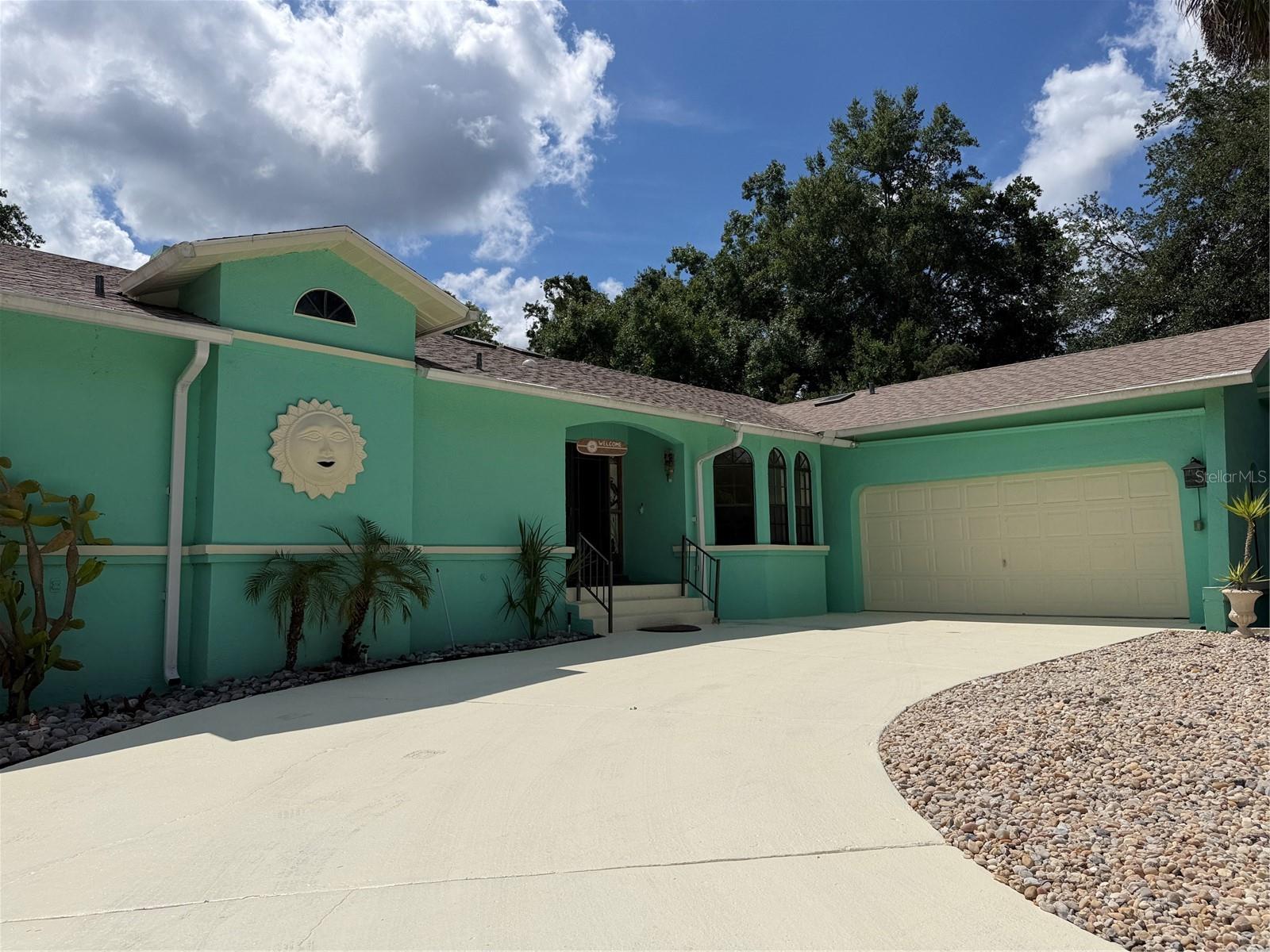 Virtually Staged. Welcome to waterfront living in the desirable Riverhaven Village community in Homosassa. This well-maintained 3-bedroom, 2-bath concrete block home offers 2,067 square feet of living space and is designed for comfortable Florida coastal living. Built in 1986, the single-story home features high ceilings, spacious living areas, coastal-inspired finishes, and a split floor plan ideal for both everyday living and entertaining. Step outside to your private screened-in pool and jacuzzi area complete with outdoor prep space and sink, creating the perfect setting for gatherings, relaxing evenings, or enjoying the Florida sunshine year-round. The property also includes a nicely sized garden area, generous storage, a two-car garage with workspace, and an oversized driveway. Boating enthusiasts will appreciate the private boat ramp access and newer motorized boat lift, providing convenient access to local waterways, fishing, waterfront dining, and nearby Gulf access adventures. Enjoy the charm of the Nature Coast with nearby springs, boating, fishing, kayaking, and local attractions just minutes away while still being conveniently located near shopping, dining, and everyday amenities. Riverhaven Village offers optional clubhouse membership for a one-time fee of $1,500, featuring access to community amenities including tennis courts, community pool, clubhouse events, and social activities. Membership is optional and not required for ownership. Quarterly HOA fee is currently low and helps maintain the community amenities and neighborhood appeal. Home is being offered with an optional furniture package for convenience, making your move to Florida’s Nature Coast even easier. Move-in ready and waiting for you to begin enjoying the waterfront lifestyle. Buyer to verify all measurements, fees, memberships, and community information independently. Roof was recently replaced and Solar Panels provide the benefits of electric bills under $40.00 a month for this owner. The pool and spa are heated. The pool equipment has WIFI communication capabilities and a pool sweep. Home comes with four surveillance cameras. Video coming soon. Matterport  360 will be added next week.