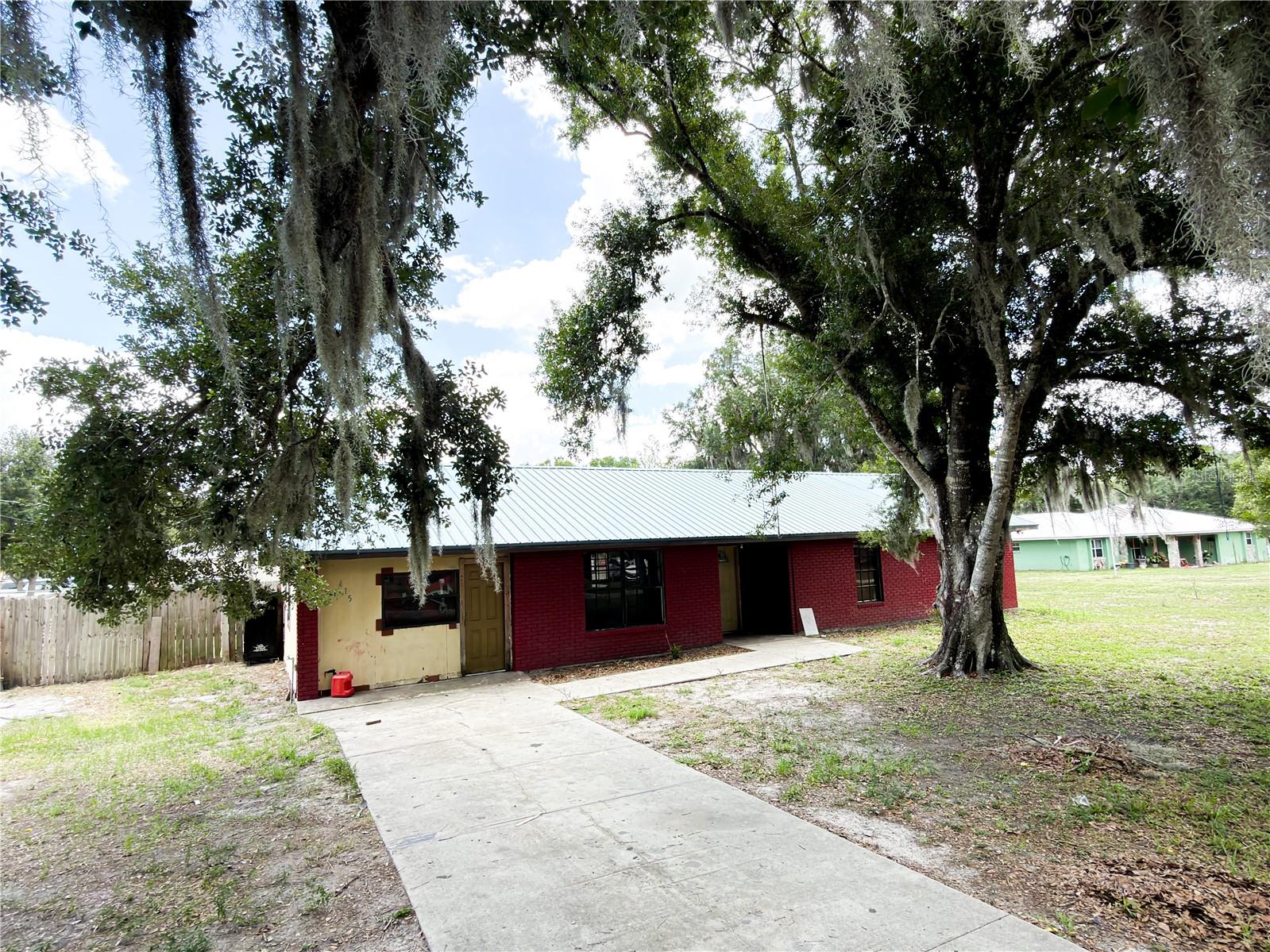 Opportunity awaits in Zolfo Springs! Priced at just $250,000, this 3-bedroom, 2-bath home offers a versatile bonus room that could easily serve as a 4th bedroom, home office, playroom, or flex space. Situated on a spacious 0.339-acre lot, the property features a fully fenced backyard with plenty of room for pets, play, or outdoor entertaining.
Major updates have already been completed, including a new metal roof in 2025 and an AC unit replaced in 2023. The interior has been partially refreshed with fresh paint, providing a great starting point for the next owner to make it their own.
With 1,898 square feet under roof, this home offers tremendous potential for a starter home, investors, or anyone looking for a property with solid bones and room to add value. A little TLC and finishing touches will go a long way in transforming this property into something special.
Don't miss your chance to own an affordable home with great potential and major recent upgrades in the heart of Zolfo Springs!