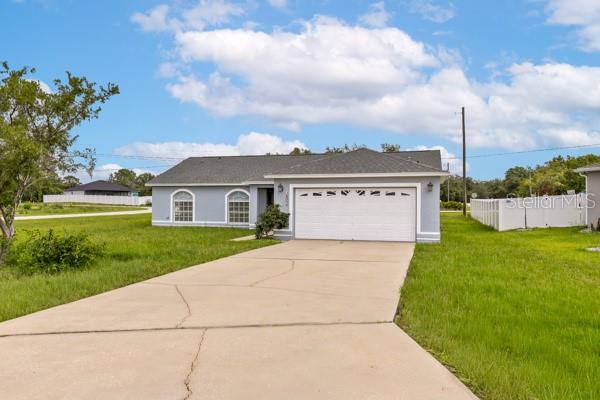 Perfect first home! This spacious 4-bedroom, 2-bath residence is situated on a large corner lot in Kissimmee, offering  plenty of outdoor space. Featuring a functional floor plan and generous living areas, this move-in-ready home provides an excellent opportunity to add your personal touches and make it your own. Roof replaced in 2021 and A/C installed in 2019. Priced aggressively to reflect minor cosmetic improvements and provide exceptional value. Motivated seller—bring all offers!