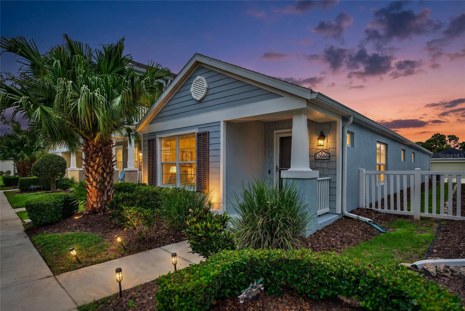 Living in Grand Palm is a true Florida lifestyle. With all the Amenities offered It's like being on Vacation. This area of the community are cottages with alley garages out back to keep that hallmark feel when you pull up to the home. Parking is also located out front. This home is located across from a park for those morning or afternoon strolls. The Club House facilities are walkable from the home. The open floor plan brings the living dinning and Kitchen together for a nice open feel. A guest bedroom and bath off this area and the master in the back for privacy. Offering a walk-in closet & His & Her sinks. Laundry is also Inside with access to the two-car garage. The home was just recently painted Inside & Out. Only 20 minutes to Venice Island and Beaches. Come see this home & Development to see for yourself.