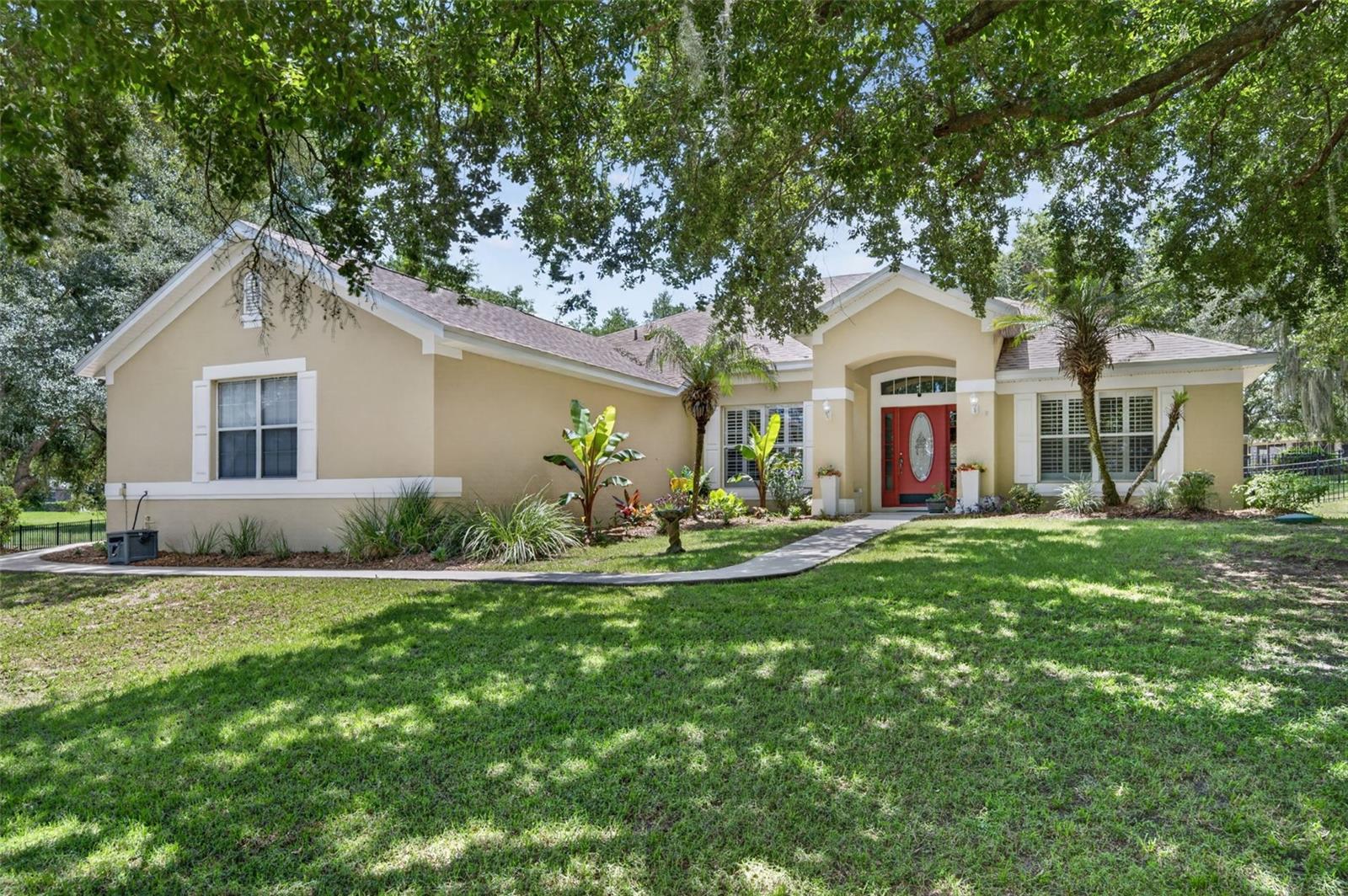 Golf Course Living Awaits in Black Bear Reserve! 
Discover the secluded comfort in this impeccable 4-bedroom, 3-bathroom plus den home within the premier Estates at Black Bear Reserve in Eustis, FL. This exceptional community is designed for those seeking a one-of-a-kind lifestyle that effortlessly combines oversized lots, custom homes, and premium recreation.

The Interior: Step inside to find a spacious and inviting layout featuring a versatile private den that is ideal for a home office, library, or hobby room. The interior is beautifully enhanced by timeless plantation shutters, laminate flooring throughout the home ( Tile in the Kitchen and bathrooms) including upgraded granite countertops and stainless-steel appliances and fireplace. The home comes with peace of mind of the updates of the  Roof 2023, HVAC 2024 and Water Heater 2025.

The Outdoor Entertaining area:
Situated on a generous 1.29-acre lot, this property allows you to revel in both total privacy and a deep connection to the natural Florida landscape. The inviting fenced in backyard features a custom firepit creating the ultimate atmosphere for evening gatherings under the stars.

Resort-Style Amenities:
Residents enjoy world-class amenities right at their doorstep without the high cost of HOA fees.  An 18-hole championship golf course designed by P.B. Dye. The course offers a challenging yet enjoyable experience for all skill levels. Residents have access to a state-of-the-art TopTracer practice facility. Beyond golf, the community provides tennis courts and a playground, a clubhouse and the Bear’s Den Restaurant & Bar offering the perfect spot for dining and socializing with neighbors in a close-knit atmosphere.

Location & Convenience:
Enjoy a prime location just minutes from the charm of historic Downtown Eustis and the enchanting shops and boutiques of Mount Dora. Best of all, you are just minutes from the 429 Expressway, offering seamless commuter convenience to Orlando and beyond.
Call and schedule your showing today!