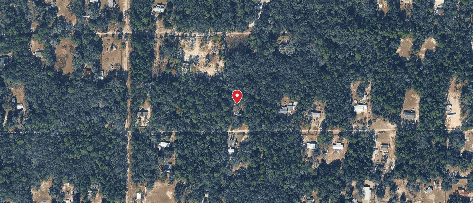 Location, location, location – a rare find! This 1.25-acre lot is ready for your dream home. Situated on a compacted road. Are you searching for peaceful country living while staying close to everything - this is it! Just minutes from Hwy 200, with a hospital, Walmart, shopping, and dining only minutes away. Experience the best of both worlds: a secure, private setting while being only minutes from city conveniences. Love the outdoors? You’ll be near endless recreational opportunities including biking, hiking, and kayaking in beautiful Ocala. And don’t forget, the world-famous World Equestrian Center only 15 miles away, and Rainbow Springs is only 13 miles away! Don’t miss this opportunity to own a piece of Florida paradise!