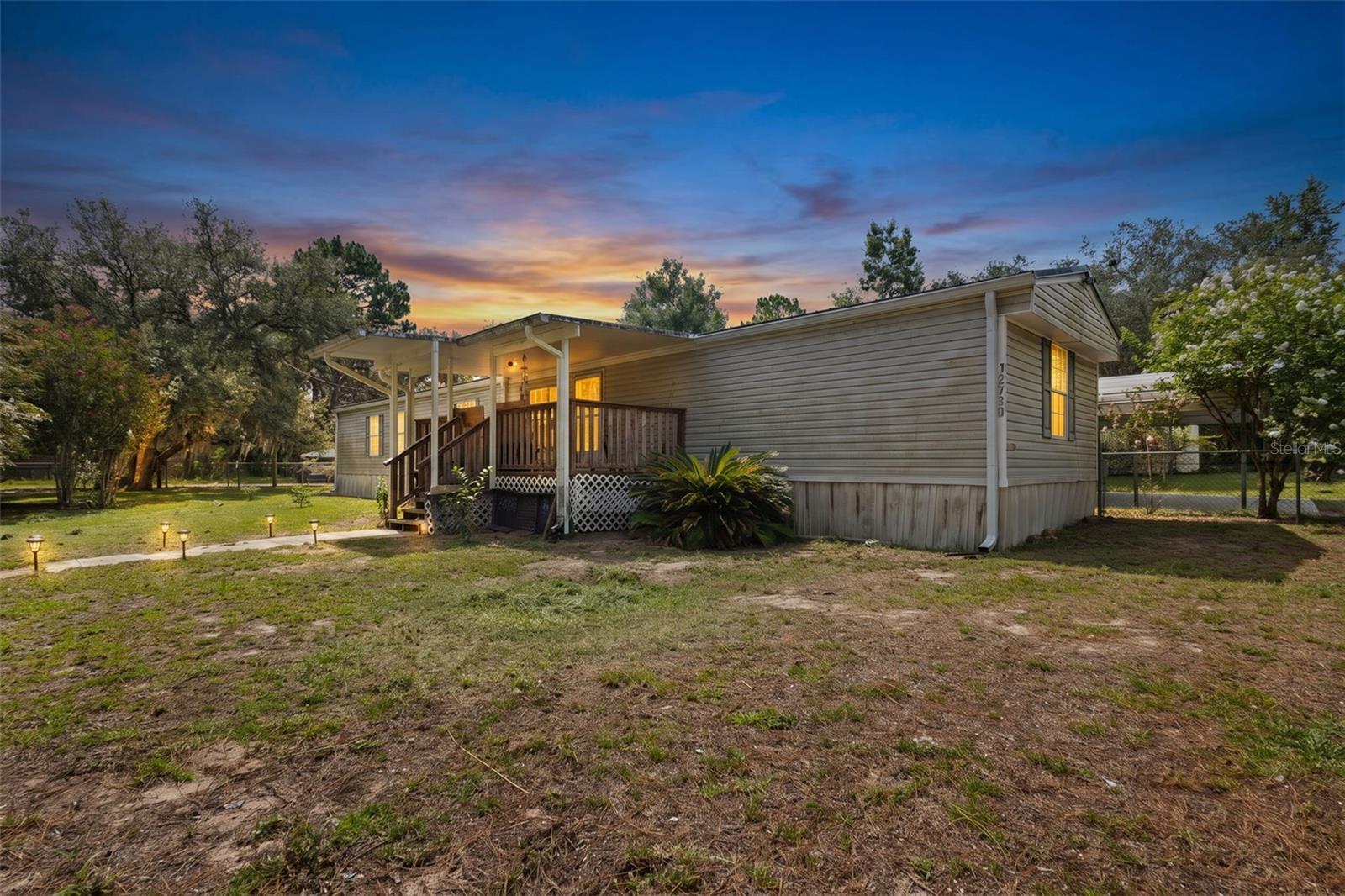 Welcome to peaceful country living on 4.74 fully fenced acres in Williston! This 3-bedroom, 2-bath home offers the perfect blend of comfort and functionality with plenty of room for animals, hobbies, and outdoor living. Recent updates include a metal roof (2022), new HVAC (2022), and a new water heater (2025), giving buyers added peace of mind. Outside, you’ll find three chicken coops ready for your flock, along with a large workshop featuring concrete floors and electricity—perfect for storage, projects, equipment, or a home-based business. Completely fenced with an electric gate opener this property is ready for you! Whether you’re looking to start a small homestead, enjoy country living, or simply need room to spread out, this property has endless possibilities. Conveniently located while still offering the privacy and tranquility of rural Levy County.