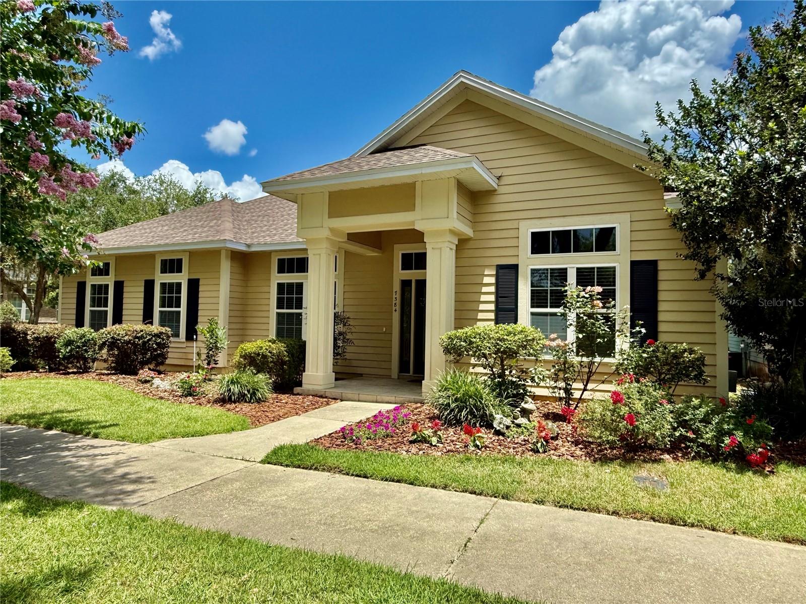 Park-front 3 Bedroom, 2 bath plus study/office home built by GW Robinson in highly-desired Garison Way.  Fantastic location off Tower Rd minutes from Kanapaha Park,Celebration Point, Butler Plaza, the University of Florida, and Shands hospitals. The spacious 2157 square feet of living space, with open floor plan and huge windows w/ transoms let the natural light shine. Bonus room could be used as a 4th bedroom or office. Luxurious hardwood floors throughout the main living area, kitchen, and breakfast nook. High ceilings, fire place, crown molding. The open kitchen is complete with 42 inch maple cabinets, quartz counter tops and quality appliances. The bedroom suite features a luxury bath with jetted tub, split vanities, and shower. The laundry room has white cabinetry, a wash sink and front loading washer and dryer. French doors off the breakfast area lead to the custom screened porch and the landscaped backyard featuring a fence made of metal and shrubbery. This exquisite home situated in a prime location faces the Live Oaks dot Garison Way community park and resort style pool with cabana, along with the benefit of additional community parking. Sidewalks connecting the entire community feature a gated entrance to neighboring Veterans Memorial Park with its playgrounds, walking trails & picnic pavilions, offers an excellent choice for those who enjoy community living and outdoor activities. Additional highlights include bonus room could be used as a 4th bedroom or office, spacious light-filled bedroom featuring built-in bookshelves and desk, new roof(2026), new tankless gas waterheater(2025), new gas range oven(2025), new refrigerator(2025), recoat hardwood flooring throughout the house(2026), and fresh paint(2026). Don't miss the opportunity to make this stunning Garrison Way residence your own and enjoy the perfect blend of convenience, luxury, and natural beauty.