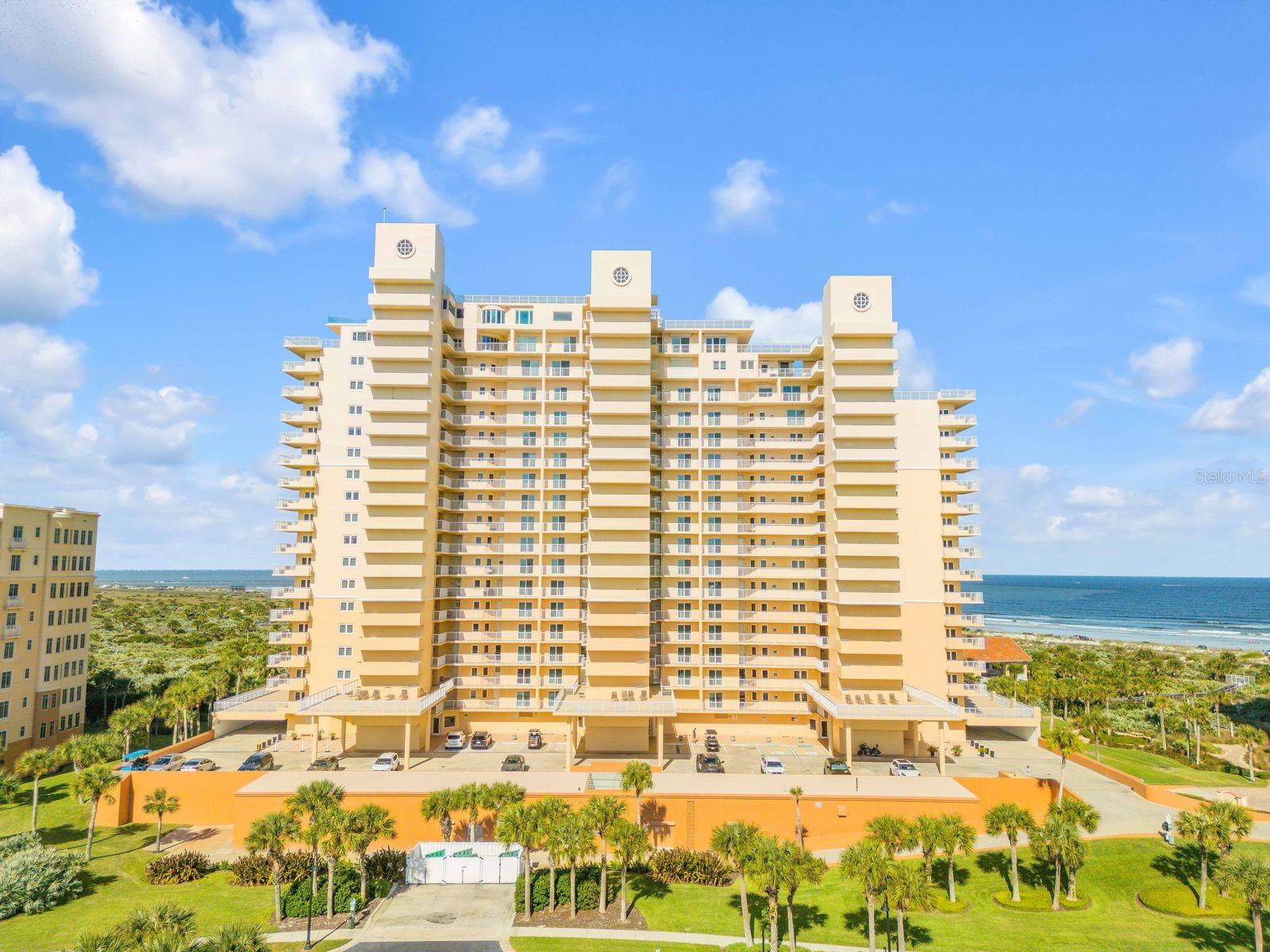 Welcome to this newly renovated spacious 2/2 residence with huge 31' x 9' private covered balcony at The Inlet!  New island kitchen cabinets with quartz countertops and tile backsplash.  Stainless steel appliances and farm sink.  New 24" x 48" marble flooring throughout the entire unit.  Freshly repainted throughout.  Being sold fully furnished with beautiful furnishings.  Large open great room opens onto the balcony and offers fantastic direct oceanfront views along with overlooking Smyrna Dunes Park, the inlet waterway, Ponce Inlet Lighthouse and beyond Ponce Inlet and Daytona Beach.  The Inlet amenities include one reserve garage parking space plus additional parking for family and guests, LSV/golf cart parking available for residents for a reasonable annual rent.  Kayak racks available to rent annually, one assigned large storage area in locked room off in garage, pool, heated spa, outdoor shower and restrooms, huge pool decking with loungers, tables and chairs, outdoor kitchen with cabana and seating, game room with ping pong table, lending library, onsite managers office, Charge Point EV charging station, electric LSV charging areas, car wash area, three renovated two story lobbies and six interior renovated elevators, and more.  Minorca ameneties to enjoy include, 24/7/365 manned security gate, multi million dollar clubhouse currently being renovated, fitness center with cardio, free and machine weights, two baths each with saunas, community pool which is heated in the winter, heated hot tub, huge decking with loads of loungers, tables and chairs to enjoy the beautiful Florida weather, four Har-Tru lighted tennis courts, ocean pavilion with restrooms, gated beach access, gated river access with marina and fishing pier, deep water boat slips currently available to purchase the exclusive right to lease separately, situated on 55 acres of well maintained grounds with side walks and is very dog friendly.  The Inlet allows, short term rentals are allowed at The Inlet and there is an onsite management program for those who wish to use that.  The community adjoins Smyrna Dunes 220 county park with miles of walking trails with Trex decking with both ocean and river access along with a dog friendly beach on the river and amazing fishing pier.  Call today for a private showing and begin to live the amazing resort lifestyle.  This residence will make an ideal primary residence, weekend beach retreat or income property along with ownership enjoyment.  All information is deemed to be accurate and room dimensions are approximate.  Buyers are responsible to verify all dimensions and other information deemed important to them.