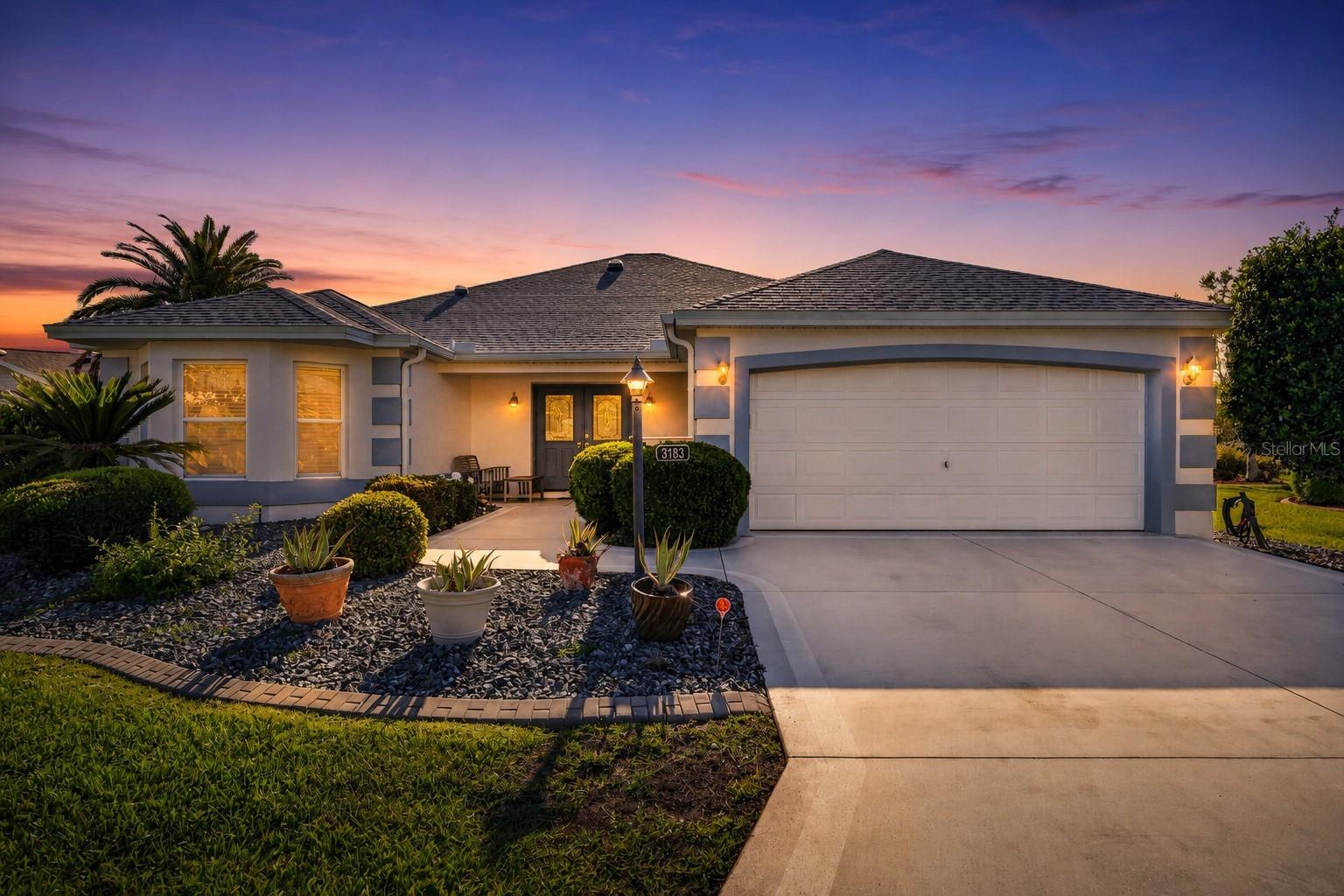 BOND PAID • TURNKEY • NEW ROOF • NEW HVAC — Welcome home to this beautifully upgraded and maintained Deluxe Grand Ficus nestled at the end of a quiet cul-de-sac in one of the area's most desirable 55+ communities. Surrounded by mature landscaping and enhanced by recent major updates, fresh exterior paint, and a new garage door opener, this exceptional property offers both peace of mind and timeless appeal.
From the moment you enter the tiled foyer, you'll appreciate the home's unique interior architecture featuring designer niches, elegant crown molding, custom built-ins, and thoughtful details rarely found at this price point. The spacious living areas flow effortlessly into the formal dining room, highlighted by a mirrored accent wall, creating an inviting setting for entertaining family and friends.
The kitchen is designed for both function and style, featuring granite countertops, pull-out pantry and cabinet drawers, double stainless-steel sinks, abundant electrical outlets, breakfast bar seating, and a sunny bay-window breakfast nook perfect for enjoying your morning coffee.
The generous primary suite offers a decorative vaulted ceiling, ample space for furnishings, direct access to the oversized screened lanai, and a well-appointed private bath with granite vanity, extensive storage, linen closet, pocket door privacy, walk-in shower with built-in seat, and bidet-equipped toilet. The guest bedroom features a charming bay window and large walk-in closet, while the versatile office/den offers walls of windows, a private exterior entrance, golf course views, and could easily serve as a third bedroom.
Outdoor living is equally impressive with a massive, screened birdcage lanai providing endless possibilities for relaxation, entertaining, or future customization. Wood and tile flooring throughout add warmth, beauty, and easy maintenance.
This special home is being offered completely TURNKEY… all that's missing is you. Just bring your suitcase and start enjoying the active lifestyle, friendships, amenities, and fun this sought-after 55+ community is known for.
Located near great shopping, the new Costco, restaurants, recreation centers, and Town Squares.  Hop on your golf cart and Go!
Easy access to the Florida Turnpike and 75.  
Schedule your private showing today and discover the unique blend of comfort, character, and updates that make this home a standout opportunity.