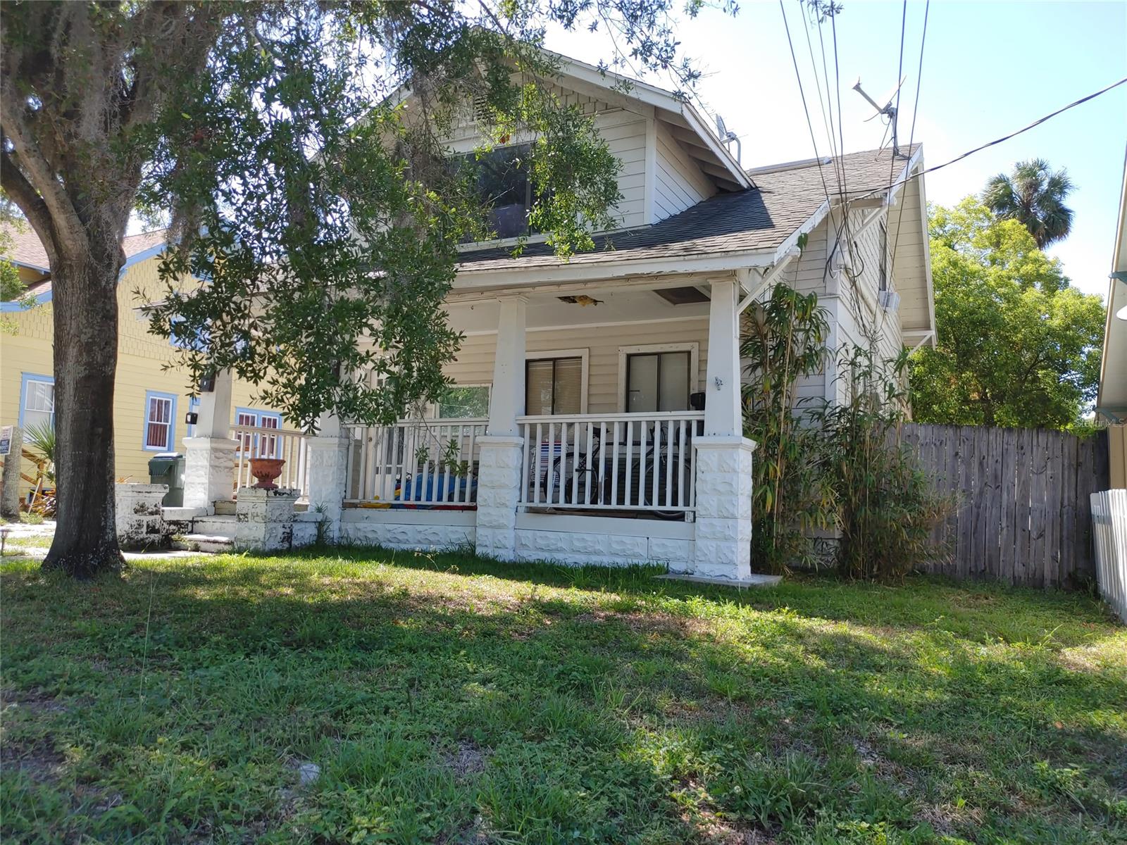 THIS UNIQUE RENTAL PROPERTY OFFERS 3 POTENTIAL RENTALS SITTING ON A 50X168 LOT. THE FRONT HOUSE HAS 2 RENTALS DOWNSTAIRS A 2/1 WITH 2 ENTRANCES AND UPSTAIRS A 1/1 WITH A PRIVATE ENTRANCE. ON THE BACK OF THE PROPERTY SITS A DETACHED 2/1 WITH A PRIVATE PORCH AREA AND SITS ABOVE A DOUBLE CAR GARAGE AND WORKSHOP. CLOSE TO BEACH STREET WHERE YOU WILL FIND RESTAURANTS AND SHOPPING. JUST CROSS THE MAINSTREET BRIDGE AND YOUR ON THE BEACH.