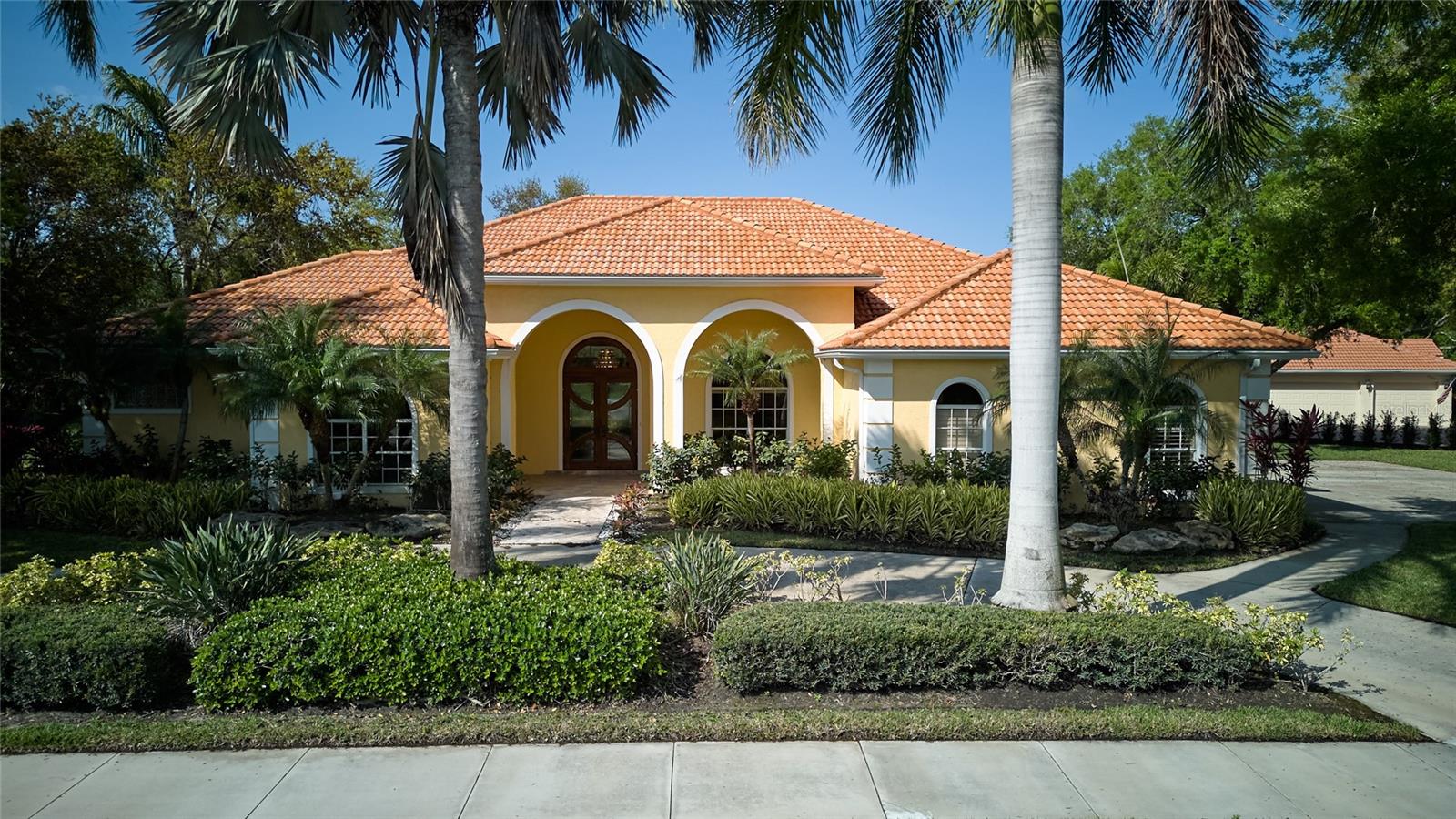 This Fantastic Prestancia home, nestled in the heart of TPC Prestancia—a distinguished, gated golf community in Sarasota—boasts 4 spacious bedrooms, an office, and 3.5 bathrooms. Spanning almost 4,000 square feet, this elegant residence offers a luxurious living experience. Set on a serene, lakefront lot over half an acre, the custom estate home presents granite countertops, an extra-large pantry, and a sprawling master suite with a sitting area and an oversized bathroom. From the striking foyer entry, discover a home with a well-thought-out floor plan, high ceilings, a gourmet kitchen awaiting your personal touch, and marble flooring. Formal living and dining rooms lead to a vast kitchen area, setting the stage for your dream culinary space. The family room, enhanced by a gas fireplace, alongside two bedrooms with walk-in closets and a shared Jack & Jill bathroom, and a fourth bedroom with an en-suite that provides pool access, adds to the home's allure. The property also features a master bathroom with dual sinks, a separate shower and tub, a cozy den/office, and a guest half-bath. Step outside to the extensive screened pool area, where tranquility meets leisure with stunning lake views, a pool, and a spa. An oversized three-car garage adds convenience. Prestancia offers an optional two 18th golf courses or social membership, your option. Located minutes away from the pristine beaches of the Gulf of Mexico (Siesta Key, Nokomis….) to the Sarasota downtown with its theaters and Opera House. Costco, Public library, farm market, shopping, restaurant and publix parks are all nearly. Easy access and quick connection to I-75. Don't miss the opportunity to make this exceptional residence your own.