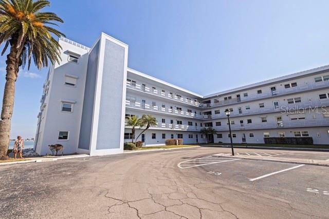 Here’s a great opportunity to own a waterfront condominium with Intracoastal canal views, and just steps to the beach!  While this unit could use some updating, there have been some nice upgrades including a new roof in 2024, a new A/C in 2023, and new hurricane windows throughout in 2024.  This is the lowest priced unit in the building, and it gives plenty of room to renovate to your tastes!  The community has two saltwater pools, an amenities center, which consists of pool tables, games and a workout facility!  Fish or watch the dolphin play from either of the two large composite docks. Enjoy everything that St. Pete Beach has to offer from this value packed location!