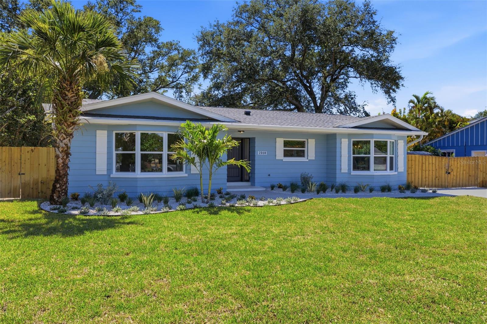 Welcome Home to Dunedin, where laid back coastal charm meets elevated design in the heart of Fairway Estates. Set within one of Dunedin’s most sought after golf course communities, this beautifully reimagined home offers a rare blend of thoughtful renovation, timeless style, and the kind of lifestyle people move here for.
Every inch has been updated with both beauty and longevity in mind, including all new plumbing, electrical, roof, HVAC, and hurricane rated windows and doors, creating a home that feels effortless, refined, and truly move in ready.
Inside, the vibe is warm, airy, and polished without ever feeling overdone. Engineered hardwood floors run throughout, grounding each space with a timeless feel, while natural light, high end finishes, and intentional details bring a sense of quiet luxury to everyday living.
At the center of the home is a showstopping chef’s kitchen featuring black stainless steel appliances, a massive island made for gathering, and striking gold quartz countertops that add just the right amount of warmth and drama. Whether it’s slow mornings at home, cocktails with friends, or hosting the holidays, this space was designed to be lived in and loved.
Two built in bay window nooks add charm you don’t come across every day, creating cozy spots for morning coffee, afternoon reading, or a quiet place to unwind. And with abundant storage throughout, everyday living feels as functional as it is beautiful.
With four oversized bedrooms, there’s room for everyone to spread out comfortably, host guests with ease, or create the home office, gym, or flex space you’ve been dreaming about. The primary suite feels like its own private retreat, complete with two closets, a soaking tub, and a spacious walk in shower designed for slow evenings and relaxation.
Outside, the home keeps delivering. Fresh sod, irrigation, and refreshed landscaping create a lush and welcoming first impression, while the setting feels peaceful and quintessentially Dunedin.
And then there’s the location. Fairway Estates is one of those neighborhoods locals know and love, with tree lined streets, golf course surroundings, and a true neighborhood feel, all just minutes from the best of Dunedin.
Because living here is about more than just the house, it’s about the lifestyle that comes with it. It’s mornings grabbing coffee before heading downtown, afternoons by the marina or golf course, sunset golf cart rides through town, and impromptu dinners on Main Street. It’s weekends spent browsing boutiques, meeting friends at breweries, catching live music, or hopping on the Pinellas Trail. It’s being close to the water, close to downtown, and surrounded by the charm and easygoing energy that make Dunedin one of Tampa Bay’s most beloved towns.
Fully renovated, move in ready, and beautifully designed, this home offers generous space, elevated finishes, and a location that makes everyday life feel a little more fun. This one feels like the Dunedin dream.
