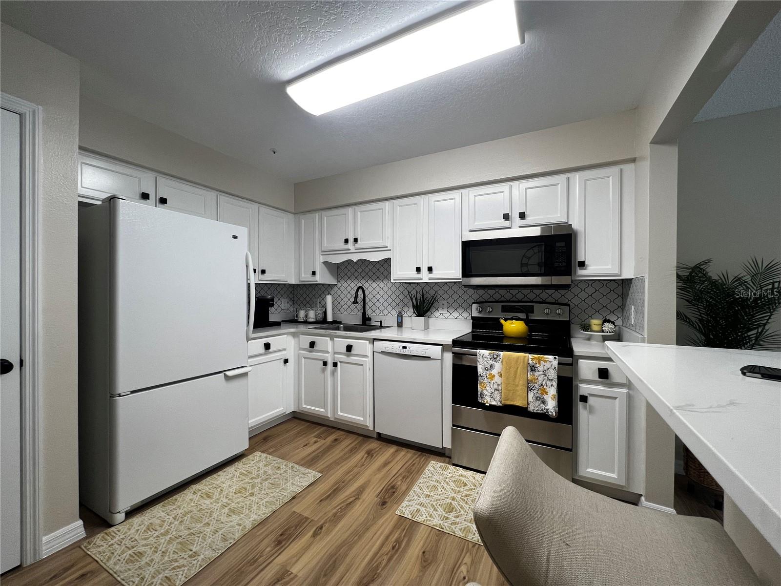 COACH HOMES AT ERROL ESTATES - Residential