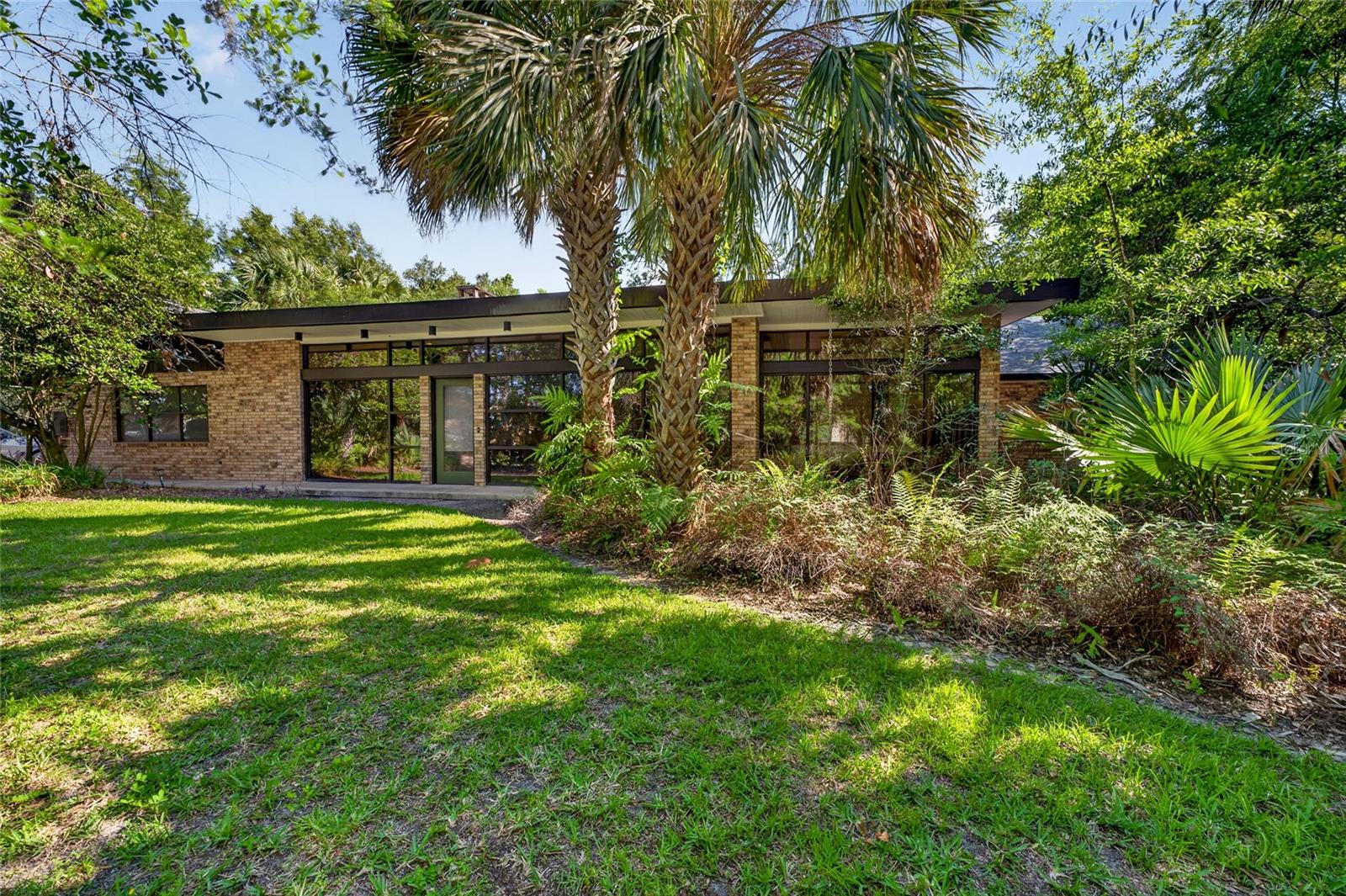 Renovated 4-bedroom, 5-bathroom pool home with 2,998 square feet on a half-acre lot in the gated Saddlebrook Resort community in Wesley Chapel, Florida. No CDD fee. The interior was rebuilt down to the studs in 2012, giving this home modern systems and finishes inside a well-established Saddlebrook setting. The 23,745-square-foot lot offers privacy and outdoor space that's rare to find inside the resort, and the home sits walkable to the clubhouse and resort amenities.
The family room features vaulted ceilings and a fireplace, creating an open and airy gathering space. Custom built-ins run throughout the home, from the living room cabinetry to the office and bedroom closets, delivering exceptional storage in every room. A whole-home Bose speaker system runs through the interior living areas and continues outside to the pool deck, ready for entertaining.
The chef's kitchen features a cooktop, a built-in Hitachi grill, high-end stainless appliances, a wine fridge, and a walk-in pantry with custom shelving. Storage is a real selling point throughout this home, from the oversized pantry to the closets and built-ins.
The primary suite is the standout. It includes two full bathrooms, a setup that's hard to find at this price point. Three additional bedrooms each function as private suites with attached full bathrooms and walk-in closets. One of the bedrooms is currently used as a home office. The flexible layout offers options for a private guest wing, a dedicated office, or separate living quarters.
Step outside to a private saltwater pool with a spacious screened lanai, professional landscaping, and plenty of room to lounge or host. The half-acre lot provides backyard space that most Saddlebrook homes don't have. The outdoor living area is built for Florida weather and quiet mornings with coffee.
Major systems are dialed in. The primary AC was replaced in 2021, and the second AC unit was replaced in 2026, giving the next owner peace of mind on the two biggest mechanical expenses in a Florida home. The attached 2-car garage adds direct entry and additional storage.
Saddlebrook Resort sits at the door with championship golf, the Saddlebrook Tennis program, a full-service spa, a fitness center, and resort pools available through separate membership. The on-site restaurants are open to the public, so residents can enjoy resort dining without a membership. The home sits minutes from The Shops at Wiregrass, Tampa Premium Outlets, BayCare Hospital, Interstate 75, and downtown Tampa. With no CDD fee, this is a rare opportunity to own a renovated pool home on a half-acre lot inside Saddlebrook, Wesley Chapel, FL.