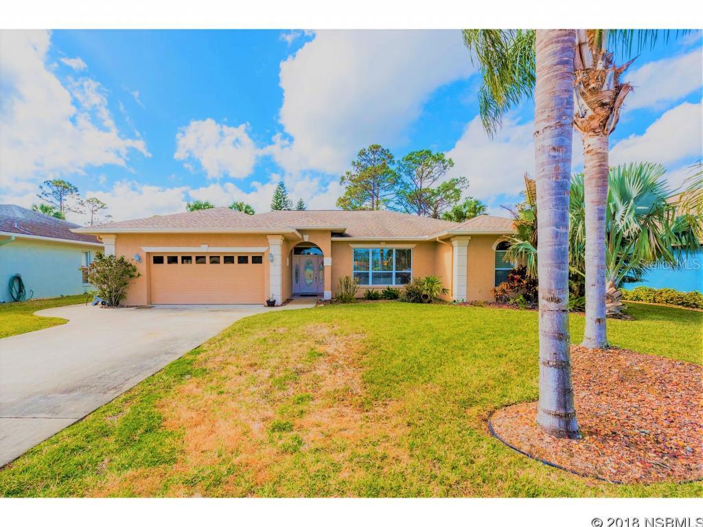 Welcome to your beautiful oasis located on the Preserve at Turnbull Bay Golf Course. You will feel like you're on vacation all throughout the year! This stunning home offers exceptional amenities such as a split floorplan with tile flooring throughout, large master suite with a garden tub, renovated kitchen with granite countertops, stainless steel appliances, 30'' induction cooktop, and beautiful custom cabinetry. Just off the kitchen, you can access the freshly painted patio and deck that leads to a lovely heated pool and jacuzzi, which is great for entertaining. This is a very special home that is move-in ready with a lot to offer. Donât miss out on this one! ;Water: City