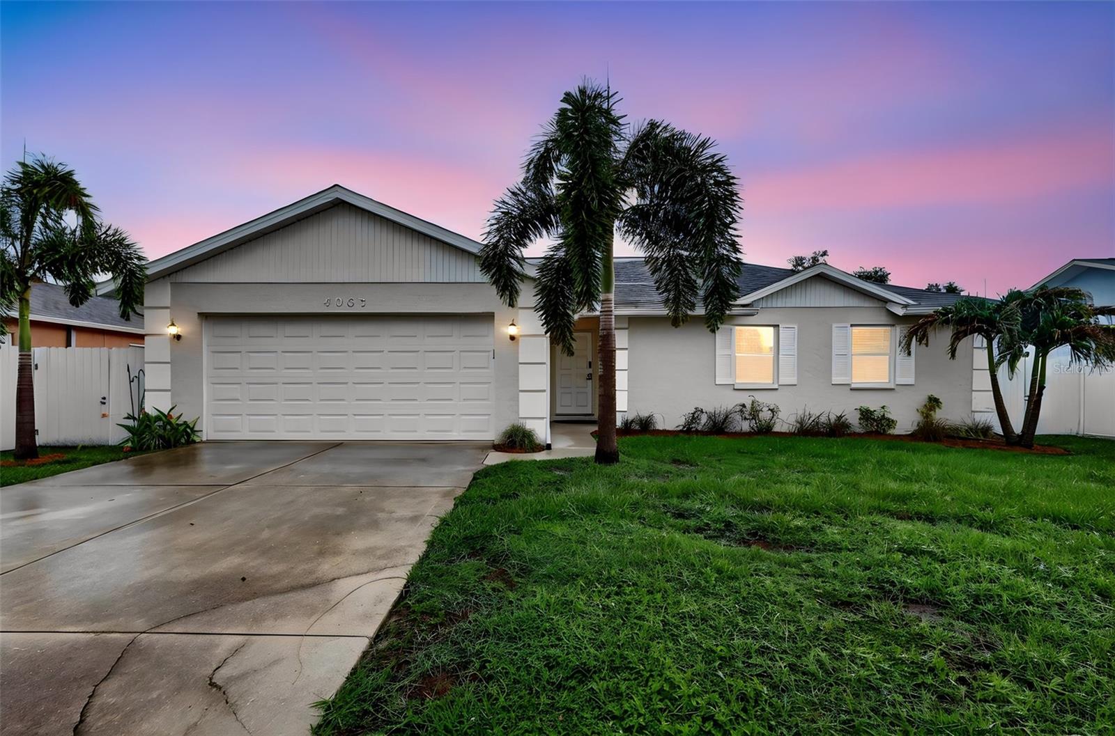 Welcome home to this beautifully updated & well-maintained Lake Sarasota stunner. Positioned on a large interior lot this home doesn't disappoint. Hurricane Impact windows offer safety, peace of mind & insurance discounts you'll appreciate. New HVAC in March of this year. Move in ready & sure to impress with updates experienced in every room. High ceilings, open concept & no wasted space add to the grandeur of this home. The generously sized lot is fully fenced in lending to the peaceful private sunset views that can be enjoyed from the large screened-in lanai. There is more than enough space to add a pool if desired while still keeping a large backyard to be enjoyed by children & fur babies. 
Equally impressive is the beautiful kitchen update that includes solid wood cabinetry, pull out drawers, granite counters, farm sink, breakfast bar, tile backsplash, pendant lights, flush mount lights, stainless-steel appliances & double oven. The large space just off the kitchen is perfect for casual dining or as a remote workspace if all 3 of the bedrooms have been claimed. 
The primary bedroom is generously sized, has newer carpet, a large walk-in closet and an ensuite bathroom that has been tastefully updated with an oversized granite top wood vanity, updated lighting, and fixtures. The second bathroom has also been nicely updated with wood vanity, granite countertops, lighting and fixtures. The Secondary bedrooms are generously sized and have newer carpet for your enjoyment as well.
Stunning tile floors greet you as you enter the home and carry throughout the common areas in the home. Updated lighting, fans and modern fixtures have been added throughout the home. The large two-car garage has an insulated hurricane impact door, utility sink, a workspace, and also comes with a Samsung washer & dryer.
Top Rated Schools, No HOA or deed restrictions, No CDD, Great for commuting and minutes to unlimited Dining, Shopping, entertainment, Lakewood Ranch, UTC, and the country's top beaches. Don't miss this amazing opportunity to make it yours today!