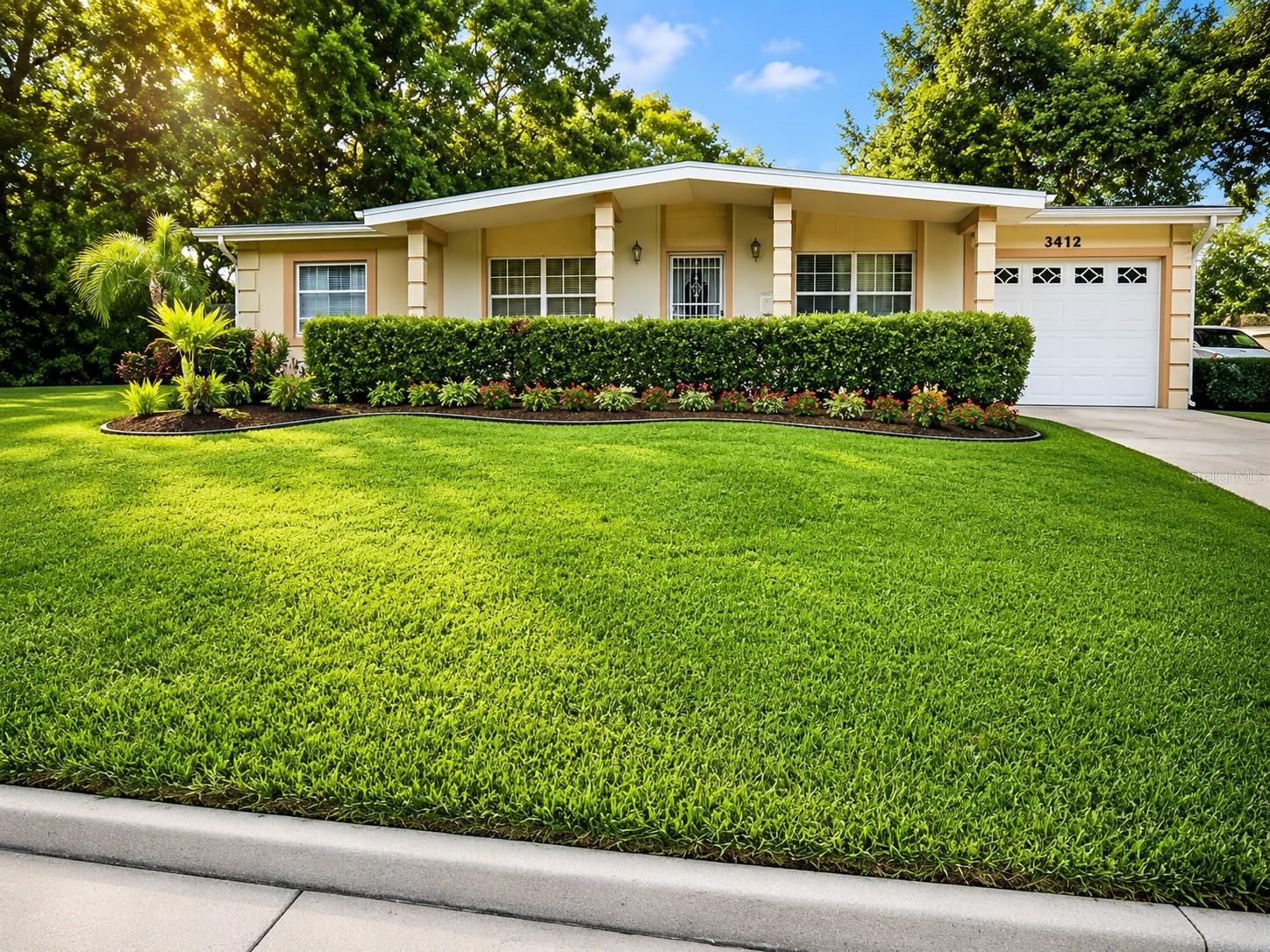 Welcome to this well-maintained 3-bedroom, 2-bath concrete block home located in the established Pine Ridge Estates community with NO HOA! This move-in ready residence features ceramic tile and laminate flooring throughout, an inviting eat-in kitchen, and a spacious living area designed for comfortable everyday living. Major recent updates provide peace of mind, including a 2024 roof, new HVAC system, updated electrical panel, new water heater, and new garage door. The oversized driveway offers ample parking for multiple vehicles, while the large backyard provides plenty of space for entertaining, gardening, or future enhancements and includes a mature mango tree. Conveniently located near SR-50, I-4, Downtown Orlando, shopping, dining, schools, and major employment centers. Whether you're a first-time homebuyer, downsizing, or looking for an investment opportunity, this property is a fantastic value with room to make it your own. Schedule your private showing today!