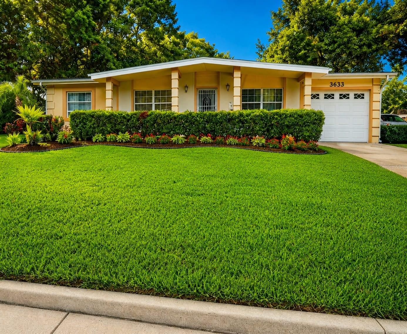 Welcome to this well-maintained 3-bedroom, 2-bath concrete block home located in the established Pine Ridge Estates community with NO HOA! This move-in ready residence features ceramic tile and laminate flooring throughout, an inviting eat-in kitchen, and a spacious living area designed for comfortable everyday living. Major recent updates provide peace of mind, including a 2024 roof, new HVAC system, updated electrical panel, new water heater, and new garage door. The oversized driveway offers ample parking for multiple vehicles, while the large backyard provides plenty of space for entertaining, gardening, or future enhancements and includes a mature mango tree. Conveniently located near SR-50, I-4, Downtown Orlando, shopping, dining, schools, and major employment centers. Whether you're a first-time homebuyer, downsizing, or looking for an investment opportunity, this property is a fantastic value with room to make it your own. Schedule your private showing today!