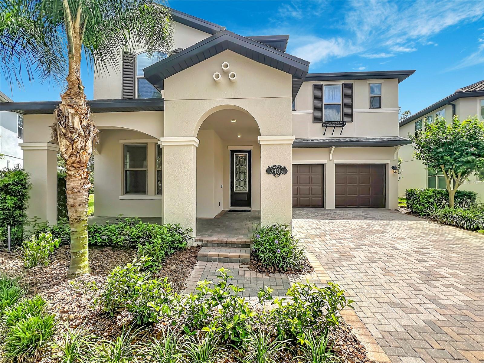 Welcome to 8409 Vivaro Isle Way, an exceptional move-in ready luxury residence located in the highly desirable community of Windermere Isle in Windermere. This impressive home offers 4,176 square feet of living space featuring 6 bedrooms, 4.5 bathrooms, and a dedicated office space.

Perfectly positioned approximately 2.5 miles from Magic Kingdom Park at Walt Disney World Resort, this elegant home offers the ideal combination of luxury, comfort, and the sought-after Central Florida lifestyle. Surrounded by conservation areas, residents enjoy privacy, tranquility, and a connection to nature while remaining close to premier golf courses, Hamlin Town Center, Horizon West, upscale dining, shopping, and major roadways.

Recently painted inside and out, this energy-efficient smart home was thoughtfully designed with both functionality and sophistication in mind. The expansive open-concept floor plan features elegant 9'4" ceilings on the first floor and 9'0" ceilings on the second level, creating a spacious and airy feel throughout the home. The gourmet kitchen showcases upgraded cabinetry, stainless steel appliances, a walk-in pantry, and generous preparation and gathering space ideal for entertaining. Additional highlights include spacious living and dining areas, beautifully designed finishes throughout, and a private office space ideal for remote work or study.

The functional layout includes two bedrooms conveniently located on the first floor, offering flexibility for guests, multigenerational living, or private workspace options. Upstairs, enjoy an ample loft filled with natural daylight, perfect for family gatherings, media space, game room, or flexible living area. The second floor also features a conveniently located laundry room and an additional junior suite with its own private full bathroom. All appliances are included, making this home truly move-in ready.

The spacious owner’s suite offers a true private retreat featuring an in-suite bathroom with a generous walk-in closet, relaxing garden tub, and separate shower designed for comfort and relaxation.

Step outside into your own private outdoor oasis featuring an extended covered and screened pool, spa, lanai, and travertine deck area designed for entertaining and year-round Florida living. The saltwater, gas-heated pool and spa combined with the spacious outdoor gathering areas create the perfect setting to relax and entertain. The fully fenced backyard and screened enclosure further enhance the outdoor experience.

With no rear neighbors and surrounded by conservation, this home offers exceptional privacy and peaceful views. Enjoy breathtaking nightly Disney fireworks and connect with nature from your own backyard.

Additional exterior highlights include future outdoor kitchen utility connections already available and newly finished epoxy garage floors that enhance both appearance and functionality.

Residents of Windermere Isle enjoy resort-style amenities including a community pool, cabana, playground/tot lot, scenic conservation surroundings, and beautifully maintained streetscapes while remaining close to Disney, golf, shopping, dining, and everyday conveniences.

Located within a highly rated school zone, this home presents a rare opportunity to own an exceptional property in one of Windermere’s most desirable communities.

Experience the lifestyle, location, elegance, privacy, and convenience that make 8409 Vivaro Isle Way truly exceptional.