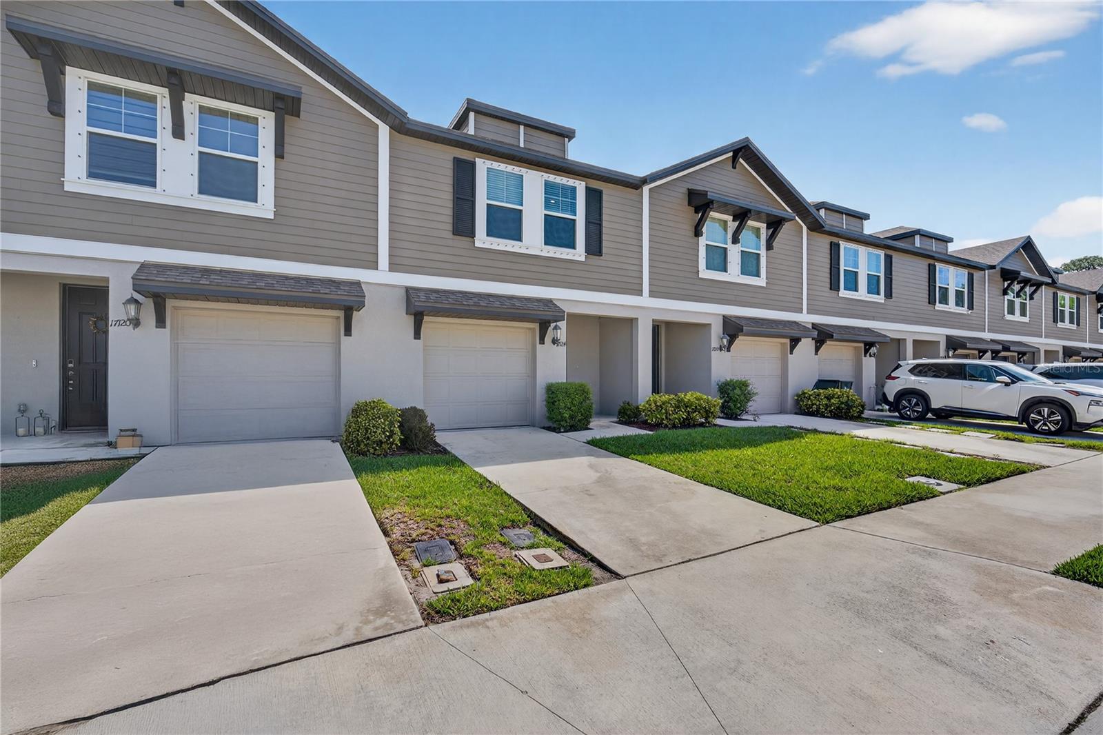 Virtually Staged. PRICE REDUCTION - THE BEST DEAL IN SPENCER COVE offering rare privacy with no direct rear neighbors and built in 2023 for true low-maintenance living.

Located just minutes from Nokomis Beach, this 3-bedroom, 2.5-bath home offers 1,539 square feet of bright, open-concept space designed for both everyday living and entertaining.

The first floor features a light-filled living and dining area that flows seamlessly into the kitchen, complete with quartz countertops, white shaker cabinetry, stainless steel appliances, and a central island.

Sliding glass doors open to a private rear patio with no direct rear neighbors, a feature not commonly found in townhome communities, creating a more peaceful and natural setting.

Upstairs, a versatile loft provides flexible space for a home office, second living area, or playroom. The primary suite offers excellent natural light, a walk-in closet, and en-suite bath, while two additional bedrooms and a full bath provide space for guests or family. A dedicated laundry room adds everyday convenience.

Spencer Cove is a boutique community of just 72 homes with low HOA fees of $218/month, covering exterior maintenance and grounds care. The community is pet-friendly and allows flexible rental options up to 12 times per year, making it an excellent option for both homeowners and investors.

Conveniently located near Nokomis Beach, Downtown Venice, Legacy Trail, Sarasota Memorial Hospital, and a wide range of shopping and dining options.

In today’s market, opportunities like this, newer construction, low fees, and private setting at this price point, are becoming increasingly difficult to find.