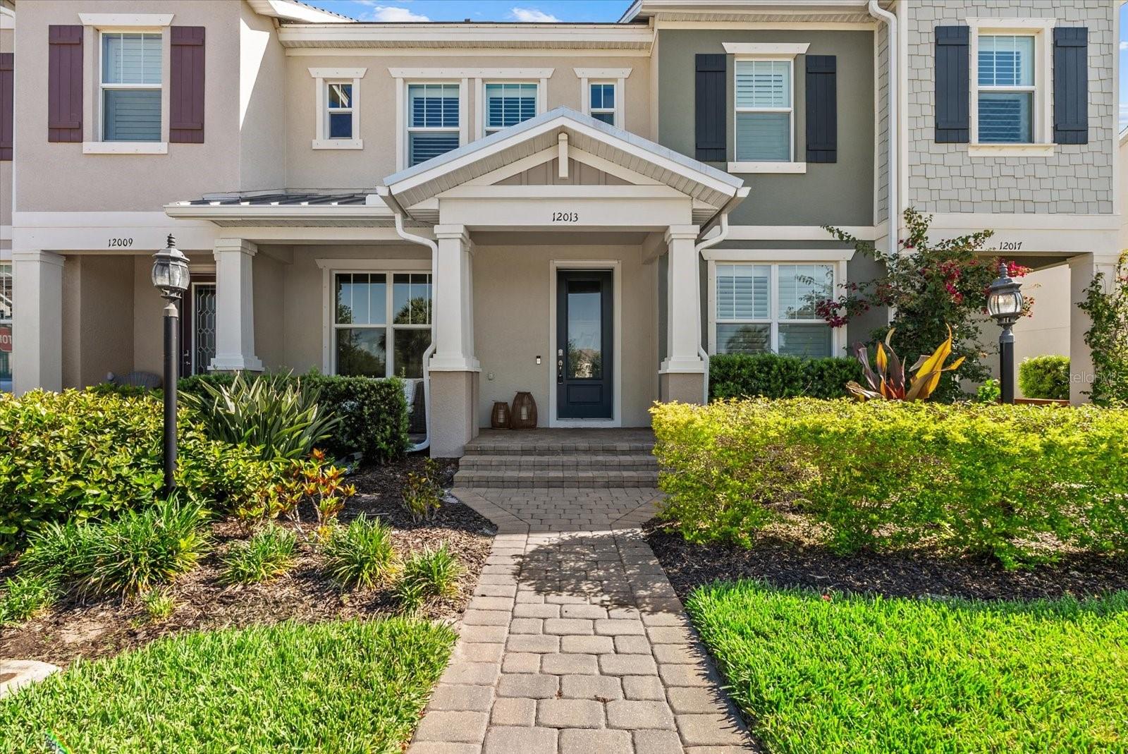 **Seller is motivated and will consider all reasonable offers so come and see this beautiful home before it is gone.**Welcome to Mallory Park, where custom design and modern comfort come together in this beautifully upgraded townhome by Pulte Divosta, set within a private gated community.
From the moment you enter, you’re greeted by a welcoming foyer that opens into a thoughtfully designed main living space. The first floor showcases high-end luxury vinyl plank flooring, adding both durability and sophistication. The open-concept layout seamlessly connects the living area to a stunning kitchen and custom bar space, perfect for entertaining. The kitchen features upgraded cabinetry, premium appliances, and a beautifully sized island ideal for gathering. Just beyond, a built-in bar with a beverage fridge and sink elevates the space even further. A door leads to your private courtyard, with convenient access to the rear garage. A half bath completes the main level.
Upstairs, comfort continues with upgraded carpeting throughout. The spacious primary bedroom features an ensuite bathroom and a generously sized walk-in closet. Down the hall, you’ll find two additional bedrooms and a full bathroom, providing both functionality and flexibility for family, guests, or a flex room. 
What truly sets this home apart is the lifestyle that comes with it. Mallory Park residents enjoy access to exceptional amenities including a resort-style pool, fitness center, pickleball courts, basketball courts, playground, and more. The community also offers direct access to Bob Gardner Park, featuring expansive green spaces, playgrounds, pavilions, sports fields, a dog park, disc golf, and scenic walking trails.
For added convenience, the neighborhood includes a direct walking path to Gullet Elementary and Dr. Mona Jain Middle School, making daily routines effortless.
This is more than just a beautifully upgraded townhome, it's an entire upgraded lifestyle.