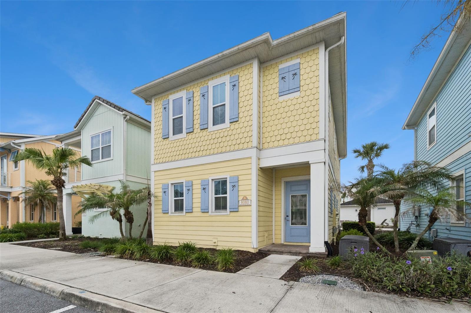 Welcome to 8060 Dreamsicle Drive, where every day feels like a vacation and every stay creates an opportunity. Located within the world-renowned Margaritaville Resort Orlando, this beautifully FULLY FURNISHED and income-producing cottage offers the perfect combination of luxury resort living, investment potential, and unforgettable Florida lifestyle experiences, all just minutes from Walt Disney World. Whether you're searching for a high-performing vacation rental, a second home in paradise, or a personal retreat that generates income when you're away, this turnkey property delivers on every level. From the moment you arrive, the charming Key West-inspired architecture, tropical landscaping, and colorful coastal design create an atmosphere that instantly transports you into vacation mode. Inside, you'll discover a thoughtfully designed open-concept floor plan featuring soaring ceilings, abundant natural light, designer finishes, and the highly sought-after "Son of a Sailor" interior package. The beautifully appointed kitchen features quartz countertops, upgraded cabinetry, stainless steel appliances, and ample space for gathering with family and friends after a day of enjoying everything Orlando has to offer. The spacious living and dining areas flow seamlessly together, creating the perfect environment for entertaining, relaxing, and making lasting memories. This home is a 3 bedroom with a bonus room. One of the most desirable features of this home is the rare dual-primary-suite layout, with (2) PRIVATE OWNER'S SUITES  located on both the first and second floors, providing exceptional comfort and flexibility for owners and guests alike. Step outside to your private tropical oasis where a beautifully paved patio, lush landscaping, and above-ground hot tub create the perfect setting to unwind under the Florida sunshine or enjoy peaceful evenings after visiting the nearby theme parks. This home is being offered fully furnished and turnkey, including furniture, televisions, artwork, décor, linens, kitchen essentials, window treatments, housewares, and more, allowing the next owner to immediately begin enjoying the property or continue operating it as a successful vacation rental. Beyond the home itself lies one of Central Florida's most exciting resort destinations. Margaritaville Resort Orlando offers a truly unmatched lifestyle experience featuring multiple resort-style pools, fitness center, on-site water park, entertainment venues, concierge services, and access to the vibrant Sunset Walk district featuring restaurants, bars, live music, shopping, nightlife, family attractions, and year-round events. Located just minutes from Disney Parks, Universal Studios, Epic Universe, championship golf courses, Orlando International Airport, shopping, dining, and major highways, this prime location continues to attract vacationers and investors from around the world. Opportunities like this are becoming increasingly rare. Whether your goal is generating rental income, owning a luxury vacation home, building a real estate investment portfolio, or simply embracing the Margaritaville lifestyle. Paradise isn't just a destination, it can be your next address. Schedule your private showing TODAY!