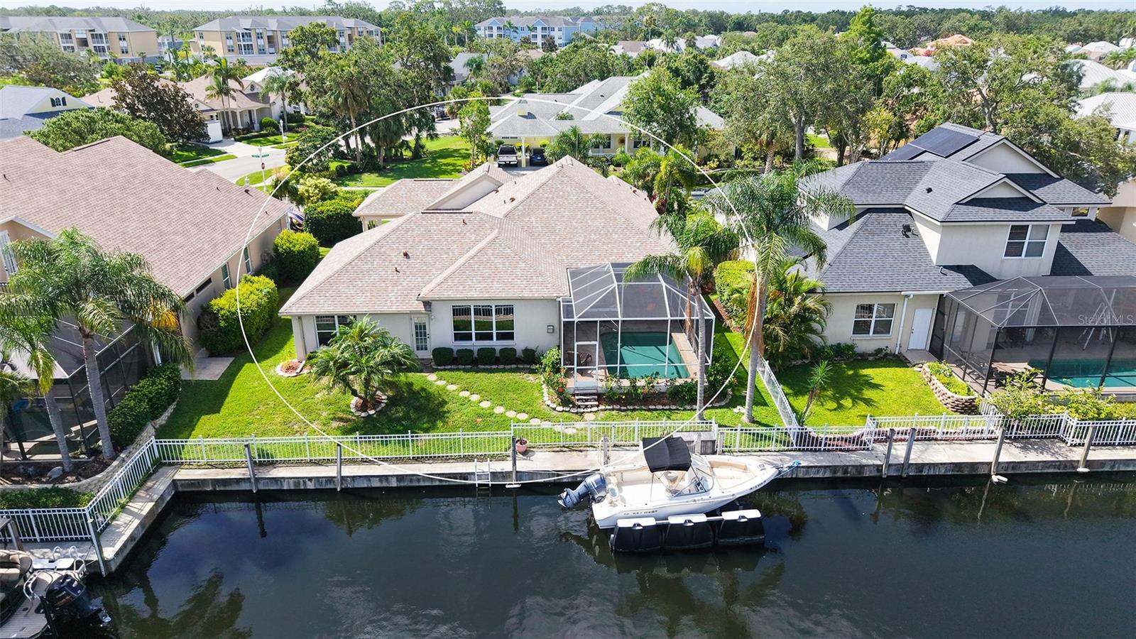 Virtually Staged. Waterfront Paradise in The Inlets | 4 Bed | 3 Bath | Private Dock & Saltwater Pool. Welcome to your dream waterfront retreat in the prestigious boating community of The Inlets! This beautifully updated 4-bedroom, 3-bath home is the perfect blend of comfort, elegance, and Florida lifestyle. A bright foyer with French front doors and crown molding opens to soaring 10’ ceilings throughout. The heart of the home is a stunning, fully renovated kitchen featuring granite countertops, custom slow-close wood cabinetry, pull-outs, a built-in pantry for extra storage. Relax in the sun-filled family room with a cozy fireplace and surround sound, or dine in the charming Café Area overlooking your outdoor oasis complete with low voltage lightening. Step outside to your newly screened (2024) lanai with a Pebble Tec saltwater pool (lifetime finish warranty) and brand new pool motor (2025) – perfect for enjoying sunsets and Gulf breezes. 
. Cruise directly from your private dock to Florida’s hidden fishing gems, island beaches, or waterfront restaurants – all just minutes away from the Gulf of Mexico. Additional features: New Roof (2024), HVAC (2017) with new ductwork and 10-year warranty UV light & Reme Halo Purfiier System in place, Crown Molding throughout, Security System. Low HOA and NO CDD fees. Located along the scenic Manatee River, The Inlets is an idyllic community just minutes from downtown Bradenton’s Riverwalk, Village of the Arts, Ellenton Premium Outlets, and Lakewood Ranch. Come experience the waterfront lifestyle you’ve been dreaming of! Come see why The Inlets is the West Coasts Premier Boating Community with its beautiful nature trails, set in the waterfront park, fishing pier, tennis courts, canoe & kayaking launch, community boat ramp and friendly neighbors. Great Opportunity on this home with Preferred Lender offering Rate Buy Down .Prime location to world class shopping and beaches, schools, fine dining. 3 major airports and 2 miles from I-75. Destination Paradise!!!