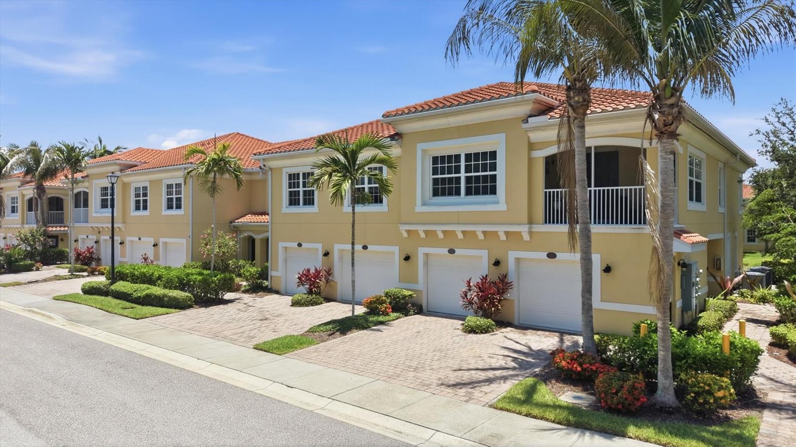 Immaculate and lightly lived-in 3BR/2BA condo in the gated community of Bay Street Village, offering beautiful water views with a fountain from the main living areas, the primary suite, and the screened lanai. The popular Ibis floor plan features an open-concept kitchen, dining, and great room with 42" upper cabinets, granite countertops, a custom tile backsplash, and stainless-steel appliances.

The designer-level, fully customized laundry room includes soft-close custom cabinets, a laundry sink, a custom backsplash, and a stacking washer and dryer, providing exceptional storage and functionality.

The primary suite offers a water view, a barn-door entry to the bath, a custom frameless glass shower enclosure with stone flooring, a linen closet, custom closet organizers, and a designer ceiling fan with light. Bedroom two also features custom closet organizers, while bedrooms two and three include custom ceiling fans. Ceiling fans are additionally installed in the great room and the lanai for enhanced comfort.

Plantation shutters are installed in the entry foyer, primary bedroom, bedrooms 2 and 3, and the family room, adding style, privacy, and a cohesive look throughout the home.

Additional upgrades include upgraded carpet on the stairs and in the primary bedroom, keyless front-door entry, keyless man-door entry, and an exterior garage door keypad.

Quality construction provides peace of mind with hurricane-impact windows and doors, concrete block construction, a tile roof, and a paver driveway.

The monthly condo fee covers water, sewer, exterior maintenance, landscaping, gated entry, a heated resort-style pool, cabana, fitness center, and clubhouse. No CDD fees.

Ideally located near Nokomis Beach, Casey Key, Siesta Key, the Legacy Trail, Oscar Scherer Park, Sarasota and Venice shopping and dining, and A-rated Pine View School. Maintenance-free Florida living at its best.