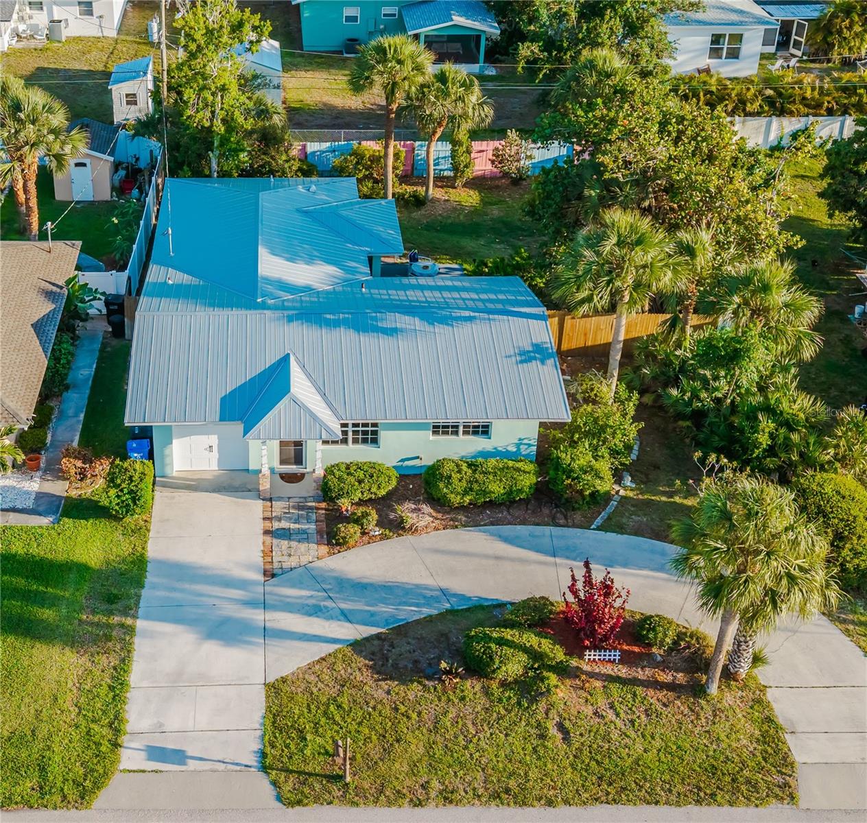 Enjoythe lifestyle on the Island of Venice.  Dream of living Florida!  Turn your dreams into an address. The outside doesn’t begin to tell the full story of this home.  This home is far more impressive than its exterior suggests including high ceilings, tile throughout, impact windows, and split plan.  Step inside this beach bungalow style home and see it has much more to discover than meets the eye.
The true charm of this home reveals itself once you enter.  Experience island living at its finest with easy access to all the lifestyle amenities you desire. Don’t miss this rare opportunity to own a tranquil tropical retreat in a prime location.  The home features three bedrooms, including a generous primary suite with elegant French doors that open to a relaxing lanai.
Two full bathrooms designed for comfort and style in a popular split plan.  Stunning tile floors throughout, and granite counters offering durability and a sleek, clean look.  The BIG ticket items already done: New Metal roof 2025, New hot water heater 5.2026, New paint interior and exterior, Tree trimming, and newer washer and dryer.
A lush tropical backyard that creates a private paradise with a privacy fence throughout perfect for entertaining or unwinding after a day sharing experiences with family and friends.  Home includes a Paddle board and Kayak racks, loft for extra space in the garage, fishing pole storage, and garage door opener.  The cozy dining room overlooks the backyard and opens to the screen lanai.  
Enjoy golf carting to the historical downtown area for shopping, dining, and entertainment including live Theater.  Like tennis?  There are lighted free tennis courts right in the downtown area.  Have a dog?  How about socializing at the dog park and beach only minutes from your new home?  Enjoy beautiful sunsets?  Only about a 10 minute walk from home to the beach and enjoy a relaxing beautiful view. Legacy trail is practically at your back door to enjoy scenic walks, jogging, or biking on this popular paved trail which also leads to the Gulf and Sharkey's Restaurant or go North to Sarasota if you are an adventurous seeker.
HOME IS NOT IN A FLOOD ZONE, NO HOA RULES OR FEES.  Ask about buyer incentives and you can enjoy this move in ready home.
Contact the listing agent today to schedule your private tour! FINAL price reduction