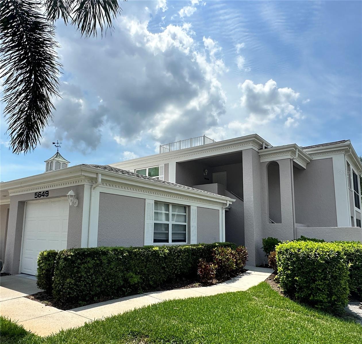 First Floor Unit! Get ready for the ultimate Sarasota Lifestyle without the hassle. Enjoy peace and tranquility central to beaches, Nathan Benderson park, downtown, golf, shopping, restaurants, entertainment and more. This immaculate (first floor) well appointed 2 bedroom 2 Bath condominium is updated and ready for you complete with a new roof. This Abode offers an open spacious floor plan with dual open air patios, views and close proximity to the community pool. A work-in kitchen with a view lends itself to a dinning and living area perfect for you and your guest. You will love the spacious master bedroom with a walk-in closet and a convenient ensuite. A large guest room makes a great space for visitors or an office. Upgrades include a new community maintained roof, garage, tile, carpet, barn door, flooring, vanities, paint, kitchen and more. Plenty of storage with interior linen closets, laundry and a garage. Sheffield Greene is an active community with all the amenities on could desire. Enjoy included cable television golf, pickleball, swimming, tennis, community center, dinning, trails a state of the art exercise facility and more. Call today for a private showing.
