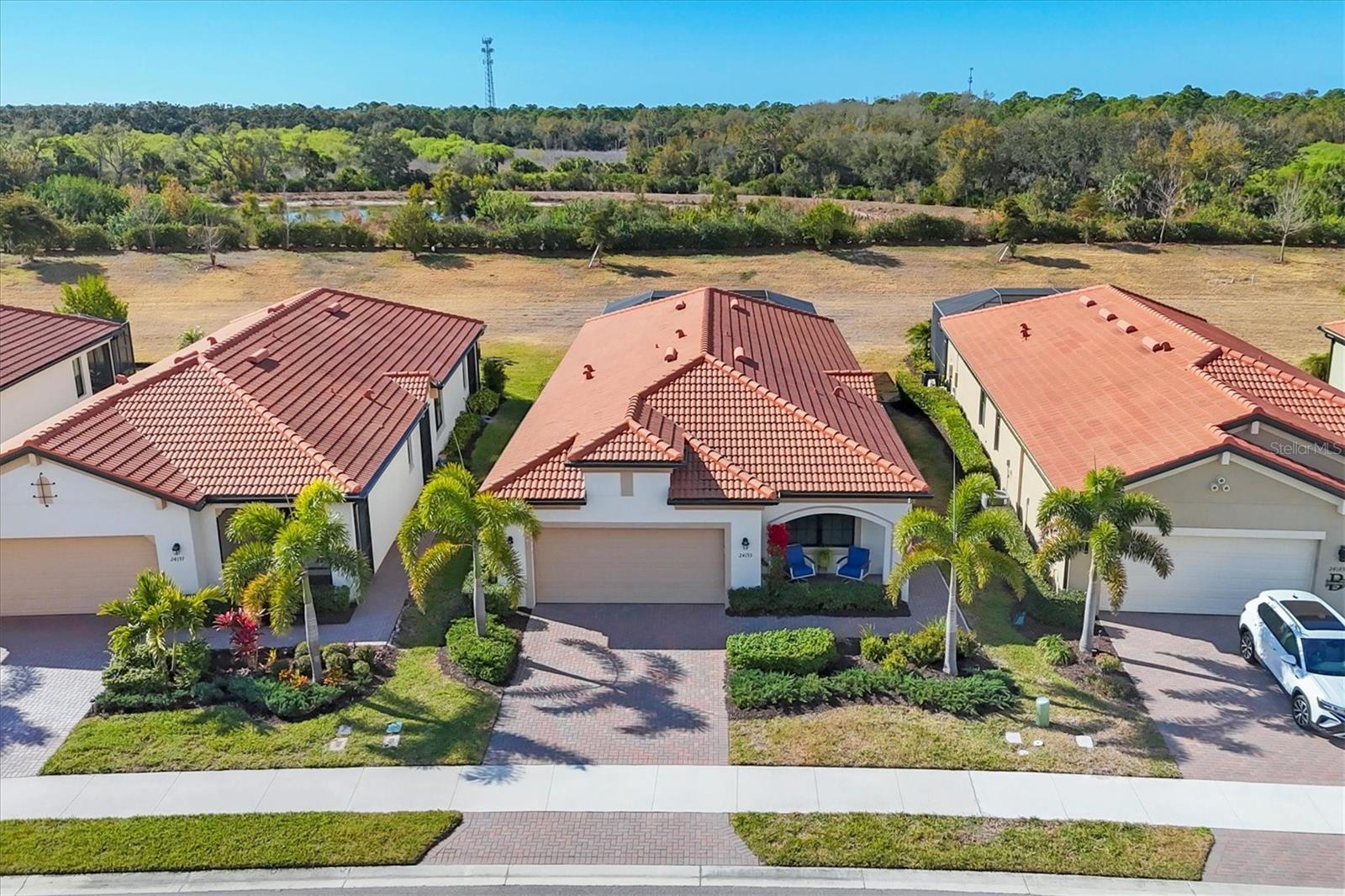 DON'T MISS THIS IMPECCABLY MAINTAINED ROMA FLOOR PLAN WITH PRIVATE  SALT WATER POOL AND SPA.  Step inside this beautiful Roma floor plan-2BD/2BA/DEN/2CG- which offers all the space you need whether your looking for a primary home or plan to be a snowbird,  this functional design fits any Florida Life Style.  PLUS 2 GOLF MEMBERSHIPS COME WITH THIS HOME.  Open Floor plan with kitchen, living, and dining all together, perfect for entertaining or quiet nights at home watching the TV.  Nice and Bright with a  Southwest exposure perfect for that natural light ambiance all day long. Helps keep the pool warmer too. Kitchen boasts GRANITE counters, STAINLESS STEEL APPLIANCES, PULL OUT DRAWERS and EXTRA recessed lights. Dining area basks in the sunshine and has plenty of room for different size tables. Living area is comfortable and sliders open to the spacious covered lanai area and pool/spa. Greenbelt area in back, very private, no homes behind, just lots of space AND PEACE AND QUIET.  SEPARATE DEN with FRENCH DOORS has multiple uses. A pull out sofa is all it needs for those extra overnight guests. Tile flooring throughout the main areas of the home. Crown Molding brings in the elegance factor.  Plantation shutters on side and front windows.   Spacious master bedroom offers en suite bath with dual sinks, walk in shower, and HUGE walk in closet. Guest bedroom at other end of home for everyone's privacy. Laundry room has tons of storage cabinets.  Sarasota National is a Vibrant community with over 1300 acres designated for preservation, conservation, lakes, and open space with amazing views, Proclaimed as an Audubon International Certified Sanctuary, making it the most gorgeous and enjoyable golf course to play at in the area. Offering resort style amenities with huge resort style pool and spa,Tiki Bar to serve refreshing drinks and a bite of lunch, tennis courts, pickle ball, Bocce courts, coffee lounge/library/card room/meeting place, 7000 sq ft fitness facilities offering classes and day spa, and a 30,000 sq ft Clubhouse with dining and spectacular views. 18 Hole championship golf course surrounded by native wetlands and preserves provides an exhilarating and dramatic back drop for your golfing adventure or just your drive through the community. TONS OF ACTIVITIES FOR NON GOLFERS. Minutes away from the new Wellen Park shopping area and Atlanta Braves stadium. Venice Beach and Venice Downtown are just a short drive. Your choice of restaurants and outdoor activities await. Come find YOUR Florida lifestyle TODAY and Live everyday like your on vacation!