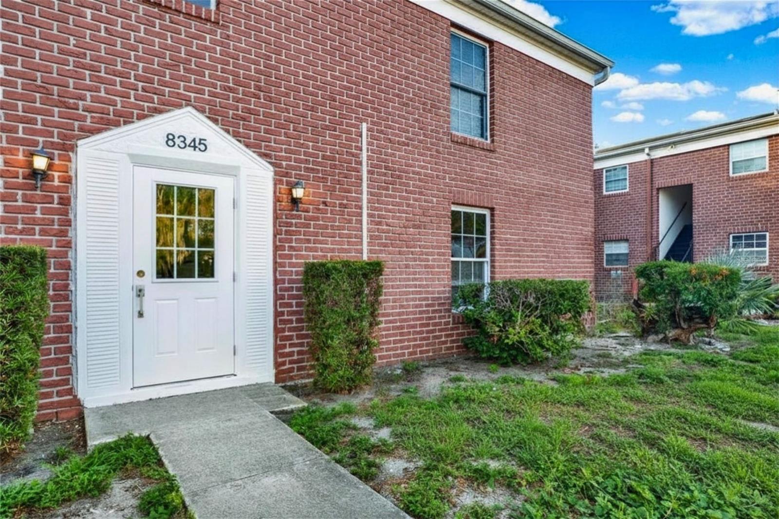One or more photo(s) has been virtually staged. Welcome to this beautifully refreshed first-floor condo located in the sought-after Jamestown community in St. Petersburg. Designed for comfortable Florida living, this move-in-ready home combines modern updates with a warm, inviting atmosphere.
Inside, you’ll find a bright open layout featuring luxury vinyl plank flooring throughout, updated contemporary finishes, and a completely renovated kitchen equipped with quartz countertops and stainless steel appliances. Whether you’re enjoying a quiet morning or entertaining guests, the space feels both stylish and functional.
The spacious living area flows seamlessly into the updated bathroom, complete with a modern vanity and sleek tiled walk-in shower. Major improvements, including a newer HVAC system and water heater, provide added peace of mind.
Enjoy relaxing outdoors on your private porch, perfect for coffee in the morning or unwinding in the evening. Additional conveniences include an exterior storage closet and assigned parking located directly in front of the unit.
Residents of Jamestown enjoy access to two community pools, tennis courts, on-site laundry facilities, and beautifully maintained grounds. HOA includes: Pool, Reserves, Insurance, Exterior Maintenance, Sewer, Trash & Water.
Ideally situated just minutes from shopping, restaurants, golf courses, and the scenic Weedon Island Preserve, this location also offers quick access to both Tampa International and St. Pete/Clearwater airports. Downtown St. Petersburg and the Gulf beaches are only a short drive away, making it easy to enjoy everything the area has to offer