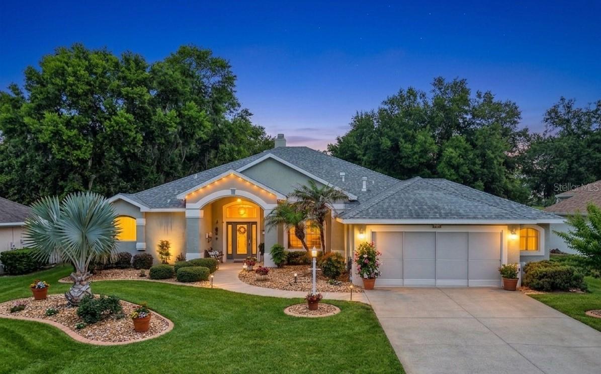 Beautiful Monarch model overlooking the 12th fairway of the Monarch Golf Course in Royal Highlands, a premier resident-owned 55+ gated golf community. This spacious and elegant home offers serene golf course views, an inviting floor plan, and thoughtful updates for peace of mind, including a 2015 roof, 2016 water heater, and 2019 HVAC system. The living room features a gas fireplace with a wood and marble mantel with a separate family room, creating comfortable spaces for both relaxing and entertaining. The kitchen offers upgraded appliances, including a smooth-top range, built-in microwave, super-quiet dishwasher, and a built-in desk area for added convenience. The owner’s suite is a true retreat with a luxurious bath featuring a jetted tub, marble vanities, and a walk-in shower with seat. Additional features include large floor tile, solid surface flooring in living areas, upgraded carpet, custom window treatments, crown molding, plantation shutters, an in-wall pest defense system, keyless entry pad, extra-wide driveway, expanded garage with screen doors, and a laundry room with closet and laundry tub enclosed in cabinetry. Enjoy outdoor living from the enclosed, air-conditioned lanai and designer patio overlooking upgraded landscaping and peaceful fairway views. Royal Highlands offers an exceptional active-adult lifestyle with an 18-hole golf course, clubhouse, restaurant, indoor and outdoor pools, fitness center, tennis, pickleball, bocce, softball, shuffleboard, billiards, craft and card rooms, library, walking paths, and a full calendar of clubs, activities, and social events. Conveniently located near shopping, dining, medical services, and Central Florida attractions, this home offers the space, setting, and lifestyle buyers are looking for.