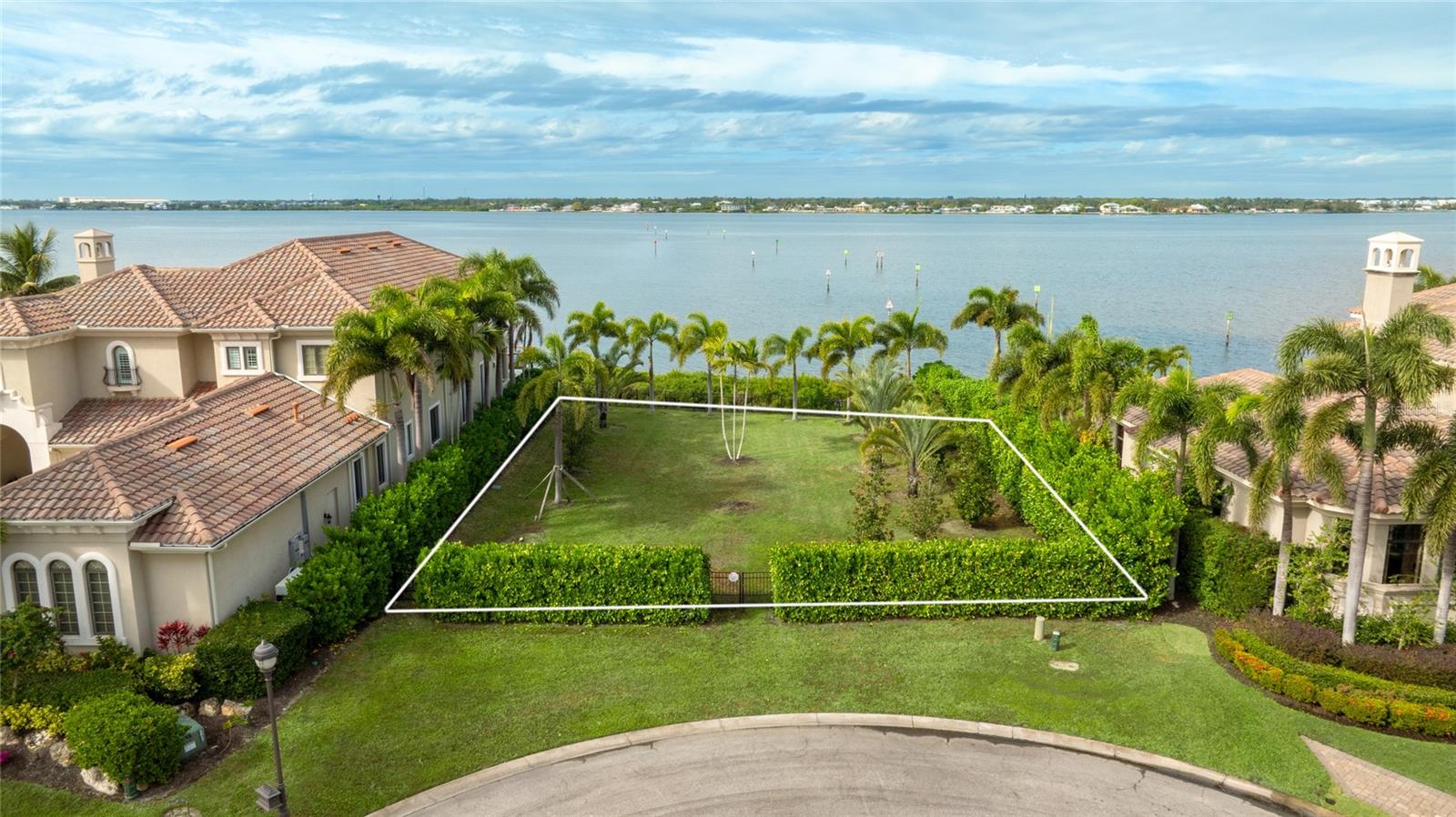 Build your custom coastal retreat on one of the last remaining waterfront homesites on the sought-after Hawk Island! Located on protected canals of the Manatee River, this exceptional lot offers a rare opportunity to design and build your dream home surrounded by beautiful water views and direct water access. This property features deeded access in the canal across the cul-de-sac for your ideal dock configuration or you can choose to build off the back of the property directly into the river. The community is gated and guarded for the perfect private retreat of luxury homes. Enjoy the perfect blend of luxury living and Florida’s boating lifestyle with peaceful surroundings, scenic sunsets, and access to the Manatee River and beyond. Whether you envision a modern waterfront estate or a relaxed coastal getaway, this prime homesite provides the ideal setting to create something truly special in one of Bradenton’s most desirable waterfront communities. The community provides convenient access to I-75, Bradenton, Sarasota, Lakewood Ranch, St. Pete and Tampa and is just mere miles from Anna Maria Island and beautiful gulf beaches. There is also an abundance of shopping, dining and entertainment options close by.