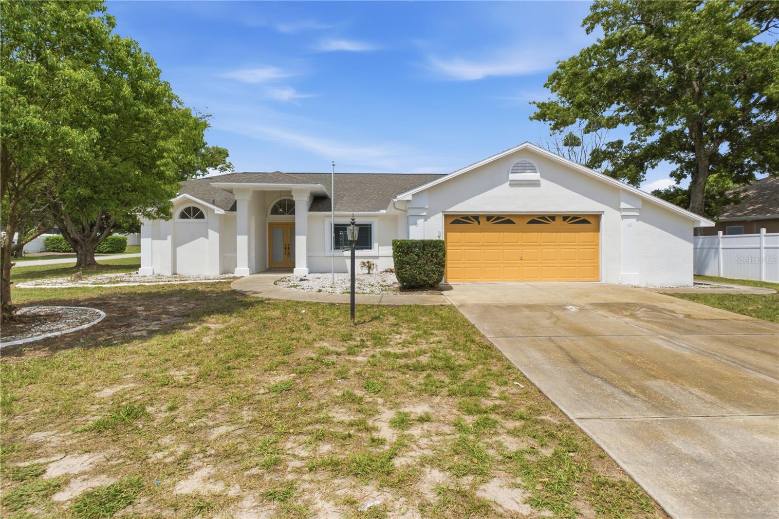 Beautifully updated corner-lot pool home featuring a new roof, fresh interior and exterior paint, a stunning remodeled kitchen, updated bathrooms, and a renovated pool. Spacious floor plan offers large bedrooms, vaulted ceilings, a flexible office, covered lanai, and bonus garage storage. Move-in ready!