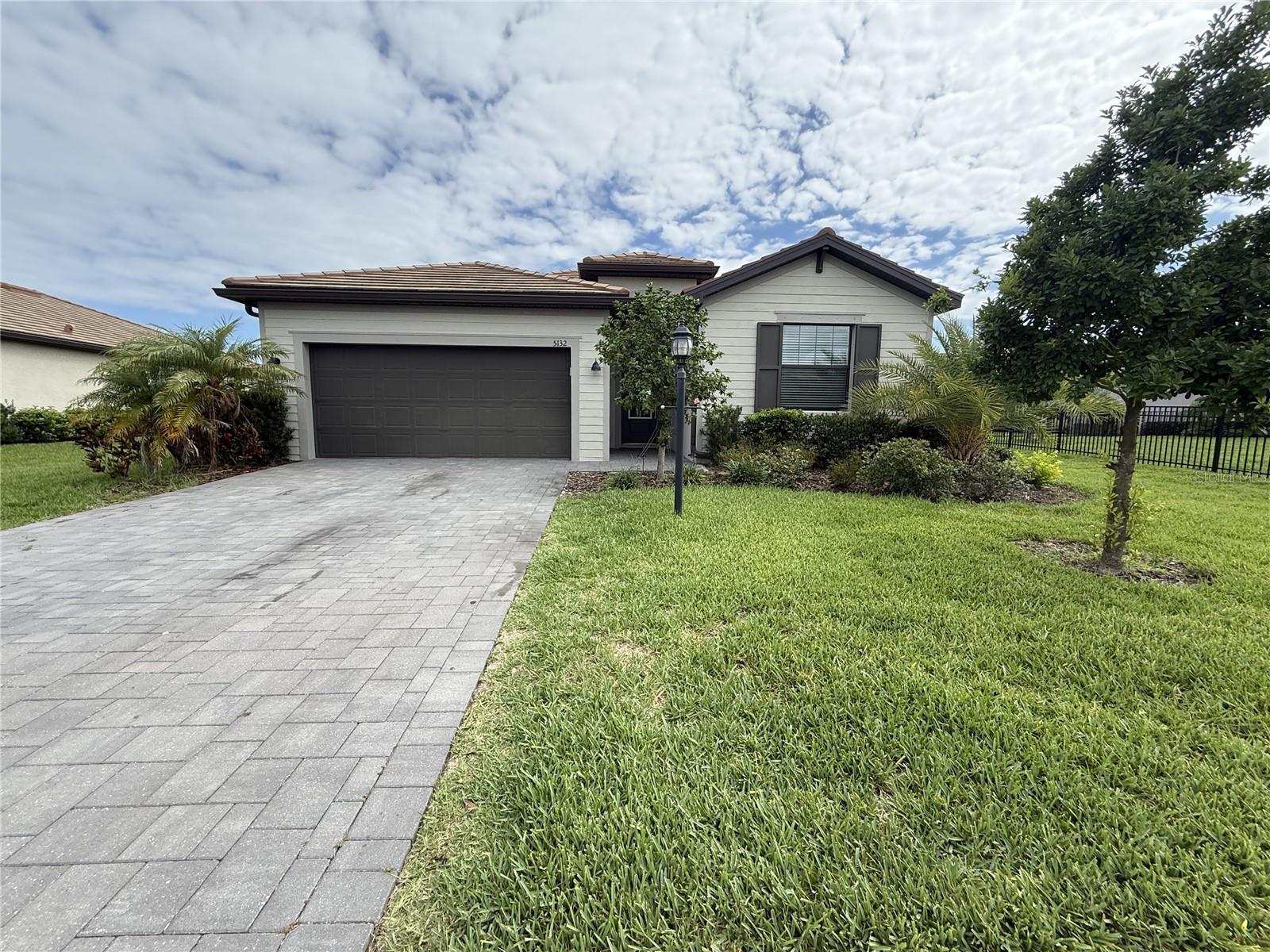 Don't miss this exceptional four-bedroom, three-bathroom pool home located within the highly sought-after Lorraine Lakes community in Lakewood Ranch. Offering the perfect blend of luxury living and investment potential, this property presents a rare opportunity to own a beautifully appointed home with immediate rental income already in place. The thoughtfully designed floor plan features spacious open-concept living areas, abundant natural light, and a seamless flow between the living room, dining area, and gourmet kitchen. Complete with modern finishes, ample cabinetry, and a large center island, the kitchen serves as the heart of the home and is ideal for both everyday living and entertaining. The split-bedroom layout provides privacy and functionality, while the spacious primary suite offers a relaxing retreat with an en-suite bathroom and generous walk-in closet. Three additional bedrooms and two full guest bathrooms provide ample space for family, guests, or tenants. Step outside to your private backyard oasis, where a sparkling screened pool overlooks peaceful lake views. Whether enjoying a morning coffee on the lanai or unwinding after a long day, the outdoor living space captures the very best of the Florida lifestyle.

Located within the gated, resort-style community of Lorraine Lakes, residents enjoy access to an impressive array of amenities, including a clubhouse, resort pool, fitness center, tennis courts, pickleball courts, walking trails, and more. Conveniently situated near shopping, dining, top-rated schools, medical facilities, golf courses, and the Gulf Coast's beautiful beaches, this location continues to attract homeowners and tenants alike.

The property is currently tenant occupied through March 2027, providing immediate rental income and a turnkey investment opportunity in one of the nation's top-selling master-planned communities. Whether you're looking to expand your investment portfolio, or secure a future primary residence while generating income in the meantime, this home offers both strong rental appeal and long-term value.

Don't miss your opportunity to own this stunning lakefront pool home in one of Lakewood Ranch's premier communities.