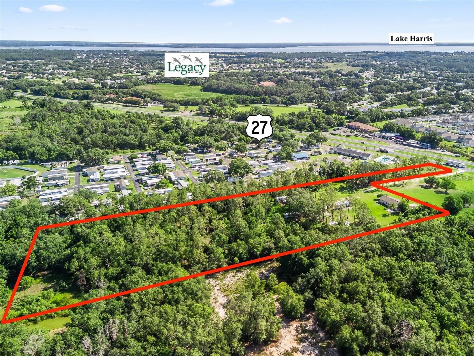 A rare 7-acre commercial tract on US Highway 27 in Leesburg, offering direct frontage and strong visibility on one of Central Florida's busiest corridors. The site has preliminary approval for seven warehouses totaling 52,000 square feet.
Land price: $4,699,900. A contractor is lined up and ready to move forward on construction, estimated at $2,800,000. A 1.5-acre outparcel is also available separately at $900,000.
The property sits in a fast-growing stretch of Highway 27, surrounded by national retailers, medical facilities, and residential growth — a strong fit for retail, office, industrial, or mixed-use development. Zoning supports a broad range of commercial uses, utilities are available nearby, and the site can be subdivided into smaller 1–5 acre tracts for flexible development or resale.
This is a solid hold for developers and investors looking to plant a flag in one of the region's most active growth corridors. Contact the listing agent for additional information.