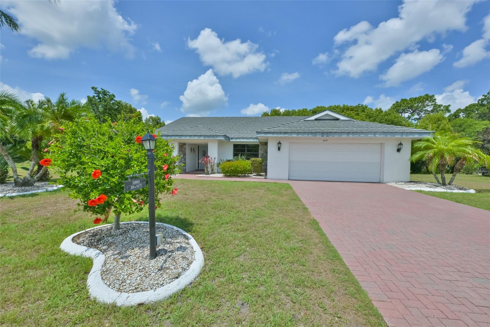 One or more photo(s) has been virtually staged. Please click on the virtual tour to see our amazing 3D tour of the home. RARE CONSERVATION HOMESITE ON OVER ONE-THIRD OF AN ACRE! Nestled on a premium 0.3283-acre lot, this beautiful 3-bedroom, 2-bath home offers over 2,555 square feet of living space and a level of privacy seldom found in Sun City Center. With only one side neighbor, no home directly across the street, and a breathtaking wooded conservation backdrop, this property feels like a private nature retreat. Enjoy peaceful views, mature landscaping, and abundant wildlife from your own backyard oasis. An underground irrigation well helps keep the grounds beautiful while reducing watering costs. Inside, you'll find a spacious split-bedroom floor plan designed for both comfortable everyday living and entertaining. The updated kitchen features quartz countertops, newer stainless-steel appliances, pendant lighting, and two sinks, real cherry wood cabinets, making meal preparation and hosting a breeze. The home also offers a wet bar, flexible bonus room, separate laundry room with utility sink, and a huge screened lanai perfect for enjoying Florida's beautiful weather year-round. Recent updates include fresh interior paint, professionally cleaned carpets, a new water heater, newer A/C, and a durable metal roof with a lifetime warranty for added peace of mind. The generous primary suite features a walk-in closet, ensuite bath with garden tub, and elegant French doors opening to the family room. The split floor plan provides privacy for both owners and guests. Whether you're hosting family gatherings, entertaining friends, gardening, birdwatching, or simply enjoying a quiet morning coffee surrounded by nature, this exceptional property offers the perfect combination of space, privacy, comfort, and Florida living. Opportunities like this are rare, schedule your private showing today!