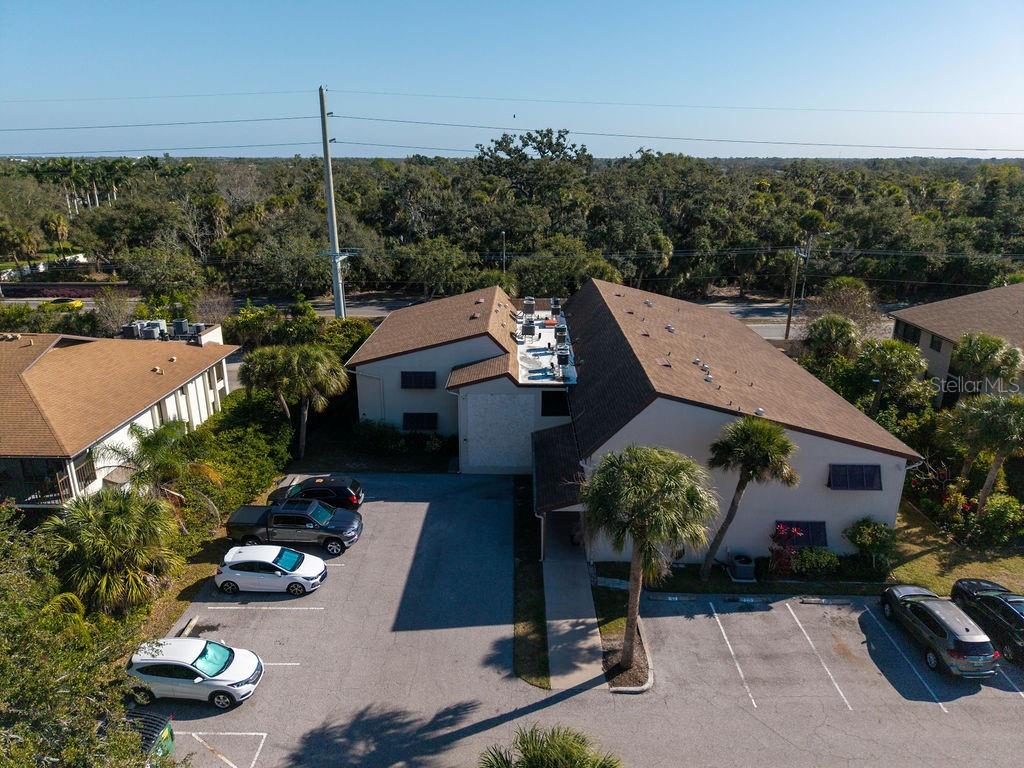 This thoughtfully updated end-unit condo in Gulf Gate Gardens is ready for you to make it home! This 1 bedroom, 1 bathroom residence offers a welcoming blend of modern comfort and everyday convenience, with the added benefit of an extra window that fills the space with abundant natural light.

The interior has been tastefully refreshed with a brand-new AC unit, tankless water heater, luxury vinyl plank flooring throughout, new stainless-steel appliances, and sleek, beautiful kitchen countertops; creating a clean, contemporary feel from top to bottom.

The enclosed rear porch provides a bright and relaxing additional living area where you can enjoy the outdoors year-round, all while appreciating the privacy of no rear neighbors. Convenient parking is located just steps from your door, and the community pool is nearby for easy access.

You’ll also appreciate the private downstairs storage space, perfect for beach chairs and other coastal essentials. Located just miles from the white sands of Siesta Key Beach and minutes from downtown Sarasota, I-75, and the UTC Mall area, this condo places you close to everything while remaining tucked into a peaceful community.

Move-in ready, light-filled, and perfectly located; this is Sarasota living made easy!