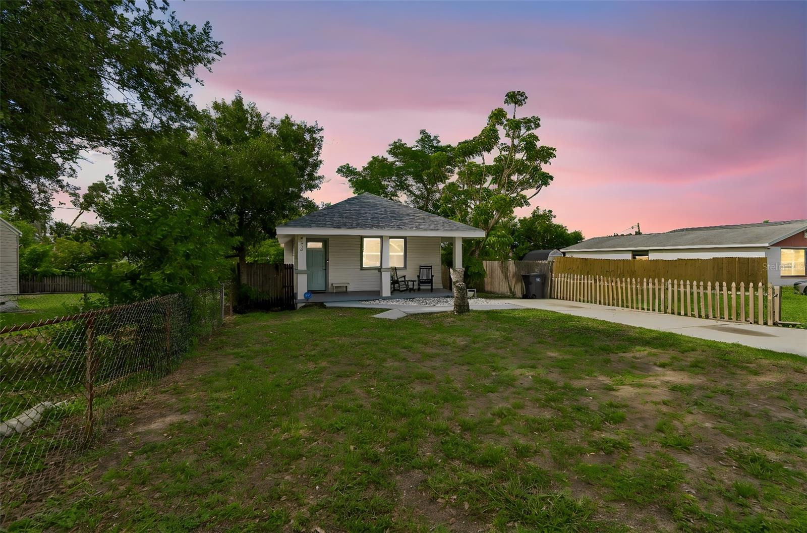 Welcome to this beautifully updated 3-bedroom, 2-bath St. Petersburg home, where modern upgrades and everyday comfort come together in an unbeatable location just 15 minutes from Florida's stunning Gulf Coast beaches. This property offers the added benefit of no flood insurance required, is located in a non-evacuation zone, and has no HOA or CDD fees.

From the moment you arrive, you'll appreciate the home's inviting curb appeal, mature landscaping, and extensive improvements, including a 2019 roof, newer HVAC system, updated windows, upgraded baseboards, contemporary lighting, recessed LED fixtures throughout the main living areas, and numerous additional enhancements designed for today's lifestyle. A UVC air purification light integrated into the HVAC system provides an added layer of comfort and air quality.

Inside, the open-concept design creates a bright and welcoming atmosphere. Luxury vinyl flooring flows throughout the main living spaces, connecting the spacious living and dining areas to a beautifully renovated kitchen that serves as the centerpiece of the home. Featuring granite countertops, abundant cabinetry, natural light, Samsung stainless steel refrigerator, range, and dishwasher, along with a GE microwave, this kitchen is perfectly designed for both everyday living and entertaining.

The private primary suite offers a peaceful retreat with vaulted ceilings and an updated en-suite bathroom featuring a walk-in shower. Two additional bedrooms provide flexibility for family, guests, or a home office.

Step outside to a fully fenced backyard with ample room for pets, outdoor gatherings, gardening, or creating your own private oasis.

Conveniently located near shopping, dining, medical facilities, schools, major employers, and I-275, this centrally located home provides easy access to downtown St. Petersburg, Tampa, local airports, and some of the area's most beautiful beaches. As an added bonus, the Hotpoint washer and Electrolux ductless dryer may convey with the home. Move-in ready and loaded with updates, this is an exceptional opportunity to enjoy the best of the Florida lifestyle.