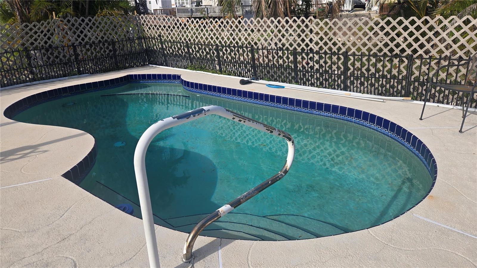 Holiday Mobile Est's (Manatee Cove) is a 55 and older community.  POOL, POOL, POOL This vacant lot has a concrete pool to the rear of the property.  You may place you home so it will fit with the pool in the rear.  This property is an exceptional value.  With membership in the club house you will have opportunity for Dances, Dinners, Pickleball, access to the Boat Ramp and many other activities.  This leisurely life style is neat Shopping, Medical Services, Restaurants, Golf Courses. Boat Ramps, Fishing and the Beautiful Beaches on The Gulf of America. See you soon.