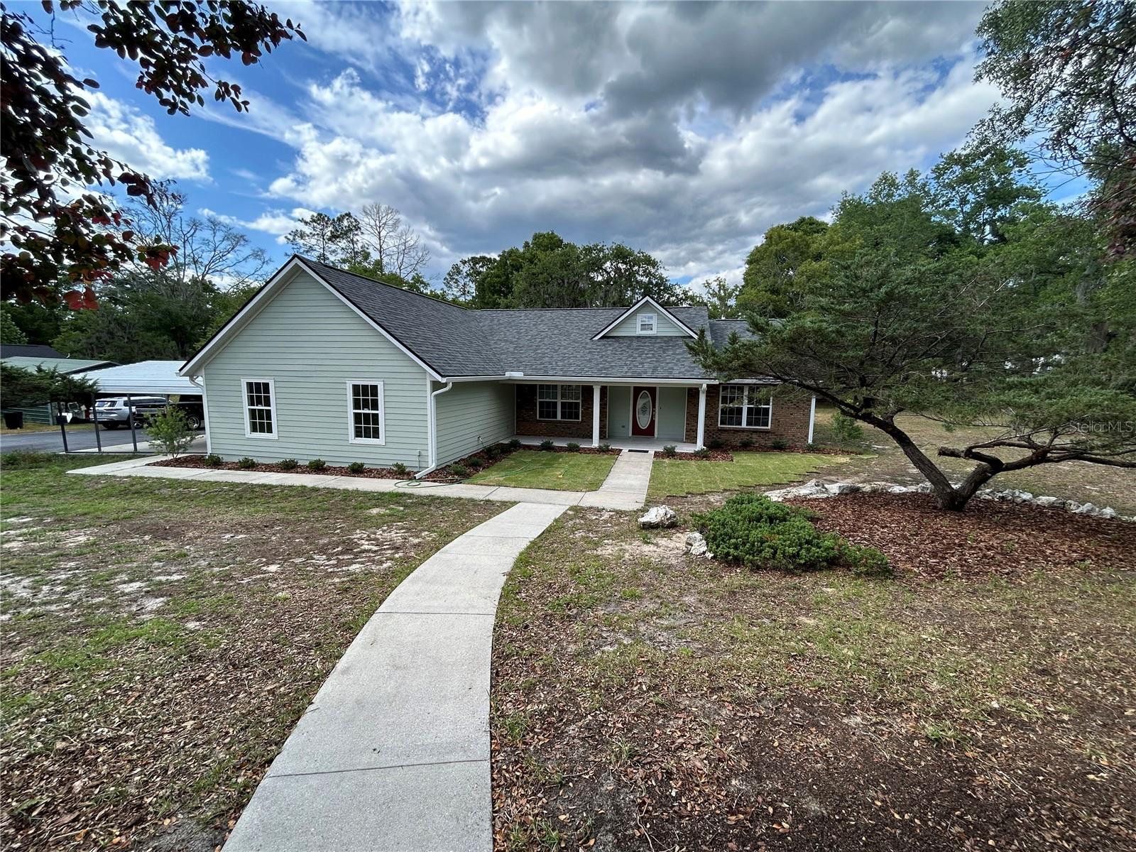 Discover comfort and peace of mind in this beautifully updated 3-bedroom, 2-bath home, offering 1,946 heated/cooled square feet and 2,735 square feet of living space in the the quiet, HOA-free neighborhood of Spring Ridge. This home has been thoughtfully refreshed from top to bottom, featuring a new roof, fresh interior and exterior paint, a new AC system with professionally cleaned ductwork for improved air quality and efficiency. The kitchen shines with granite countertops and updated appliances, while new flooring flows throughout the home, creating a clean and modern feel. Both bathrooms have been upgraded with new toilets, sinks and faucets and existing tile has been professionally cleaned to look like new. Step outside to enjoy refreshed landscaping that enhances the home's curb appeal and outdoor space. With major updates already completed, this move-in-ready home offers both style and peace of mind - without the restrictions of an HOA. Don't miss your opportunity to own this gem!