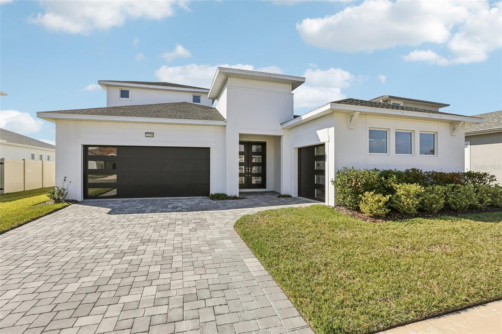 One or more photo(s) has been virtually staged. Spacious Grand Osprey Two-Story Home with 5 Bedrooms, 4.5 Baths, 3-Car Garage, Pool, Cabana, Loft, and Second-Story Balcony with Waterfront Wetland Views This Grand Osprey floor plan offers a thoughtfully designed layout with generous living spaces and a seamless blend of indoor and outdoor living. The welcoming front entry leads through a covered lanai featuring a private pool and a dedicated cabana area—perfect for outdoor dining, entertaining, and relaxation. The lanai opens into a spacious foyer that flows into the main living areas. A private entry from the 3-car garage provides convenient access directly into the family room. The gourmet kitchen includes a large walk-in pantry, ample cabinetry, and an oversized island with a built-in sink. Overlooking the open dining area and family room, this space is ideal for everyday living and larger gatherings. The primary suite, located on the main level, features an ensuite bathroom with dual sinks, a private water closet, and an expansive walk-in closet. Two secondary bedrooms on the first floor share a full bathroom with dual vanities, offering practical accommodations for family or guests. Upstairs, a spacious loft provides a versatile area for a media room, game space, office, or additional living zone. This level also includes two secondary bedrooms and a full bathroom. A second-story balcony extends from the loft, offering elevated outdoor views of the serene wetlands. The homesite is positioned to showcase peaceful waterfront wetland views, creating a tranquil natural backdrop that can be enjoyed from multiple indoor and outdoor living areas. With thoughtfully designed spaces, flexible layouts, and exceptional outdoor amenities, this home delivers both comfort and style in a desirable community setting.