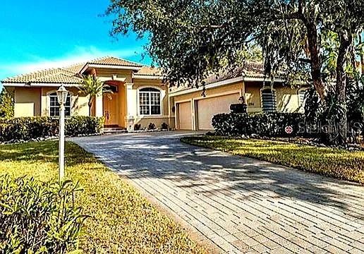 Nestled in the gated waterfront community of Amberwynd on Snead Island, this fully furnished 3-bedroom, 2-bath home with an office offers over 2,600 sq ft of relaxed Florida living. Set on over half an acre with 75 feet of waterfront, the property features a private dock and 13,000-lb boat lift with direct access to Terra Ceia Bay. Inside, enjoy a spacious split floor plan with formal living and dining areas, an open kitchen overlooking the family room, and a large primary suite with dual walk-in closets. Step outside to a screened heated pool and spa, perfect for entertaining or unwinding after a day on the water. Additional highlights include a brick paver driveway, lush landscaping with well irrigation, and a whole-house Generac generator. Located just minutes from Emerson Point Preserve, Bradenton Yacht Club, shopping, dining, and Gulf beaches, with easy access to I-275, US-41, and US-19.