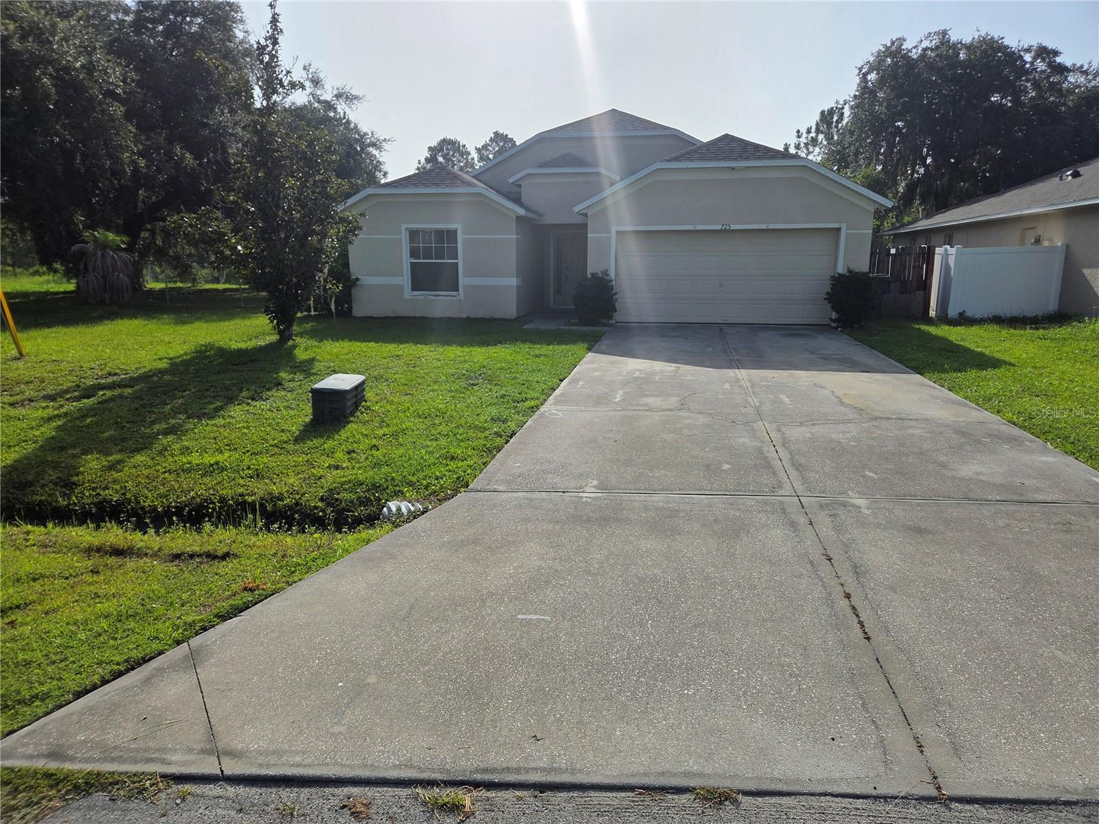 Welcome to this well-maintained single-story home nestled on a spacious cul-de-sac lot in the established Poinciana community. Designed for comfortable everyday living, this residence features a bright, open layout with generous living and dining areas that flow seamlessly into the kitchen, creating an inviting space for relaxing or entertaining.

The split-bedroom floor plan provides added privacy, with a spacious primary suite complemented by well-sized secondary bedrooms. An inside laundry room adds convenience, while the attached two-car garage offers ample parking and storage.

Step outside to enjoy the rear patio overlooking the backyard, offering plenty of room for outdoor gatherings, gardening, or simply unwinding. Situated on an oversized lot with mature landscaping, the property provides additional outdoor space while maintaining a peaceful setting.

Conveniently located near shopping, dining, schools, parks, and major roadways, this home offers easy access to everyday amenities while allowing you to enjoy the quiet atmosphere of a residential neighborhood.