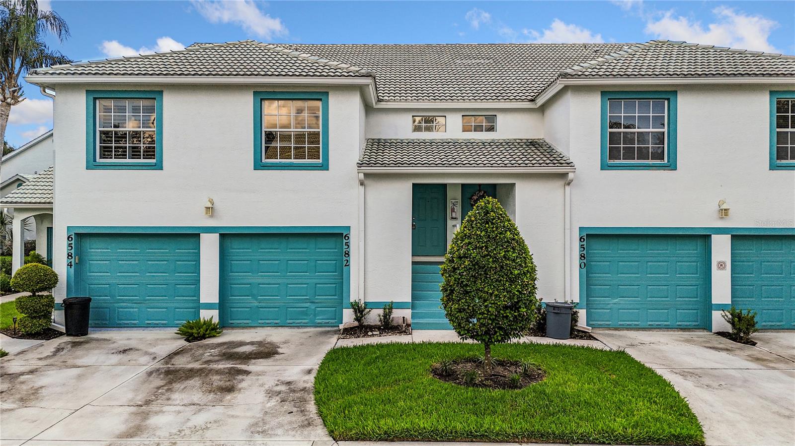 Fairway Gardens at Tara | 2BR/2BA Luxury Townhome with Garage | Social Membership Included

Welcome to Fairway Gardens at Tara — an exclusive enclave of maintenance-free luxury townhomes nestled within one of Manatee County’s most sought-after golf and country club communities. This stunning Florida/Key West-inspired residence offers the perfect blend of casual elegance and resort-style living.

The Home
This light-filled, 2-bedroom, 2-bath townhome features an open split floor plan with soaring cathedral/vaulted ceilings throughout the main living area. The fully remodeled kitchen showcases granite countertops, a center island, breakfast nook, and stainless steel appliances — ideal for entertaining or quiet mornings at home. Brand new luxury vinyl plank flooring flows through the main living areas, complemented by gorgeous ceramic tile in all wet areas and carpet in both bedrooms.

The spacious primary suite is privately situated at the rear and features a large walk-in closet and en suite bathroom. The secondary bedroom and guest bath are positioned at the front of the home for optimal privacy. Step out to your enclosed screened lanai — complete with windows and horizontal blinds — overlooking a lush green space and the community pool. A convenient attached 1-car garage with adjacent guest parking completes the package. New AC installed June 2022.

The Membership
Included with this home is a coveted Social “Class B” Membership to Tara Golf & Country Club, granting access to the beautifully appointed clubhouse, restaurant, snack bar, card rooms, heated pool and spa, fitness center, jacuzzi, and steam room. No golf or Class A membership obligation — though limited golf access may be available to Social Members at a discounted rate.

The Location
Perfectly positioned just minutes from Lakewood Ranch, Bradenton, and Sarasota, with easy access to I-75 and all corridors to Tampa/St. Pete. World-class Gulf Coast beaches and barrier island destinations are just a short drive away. Nearby you’ll find top-rated schools, shopping, dining, parks, tennis, soccer fields, and more.

(Some photos may have been staged)
